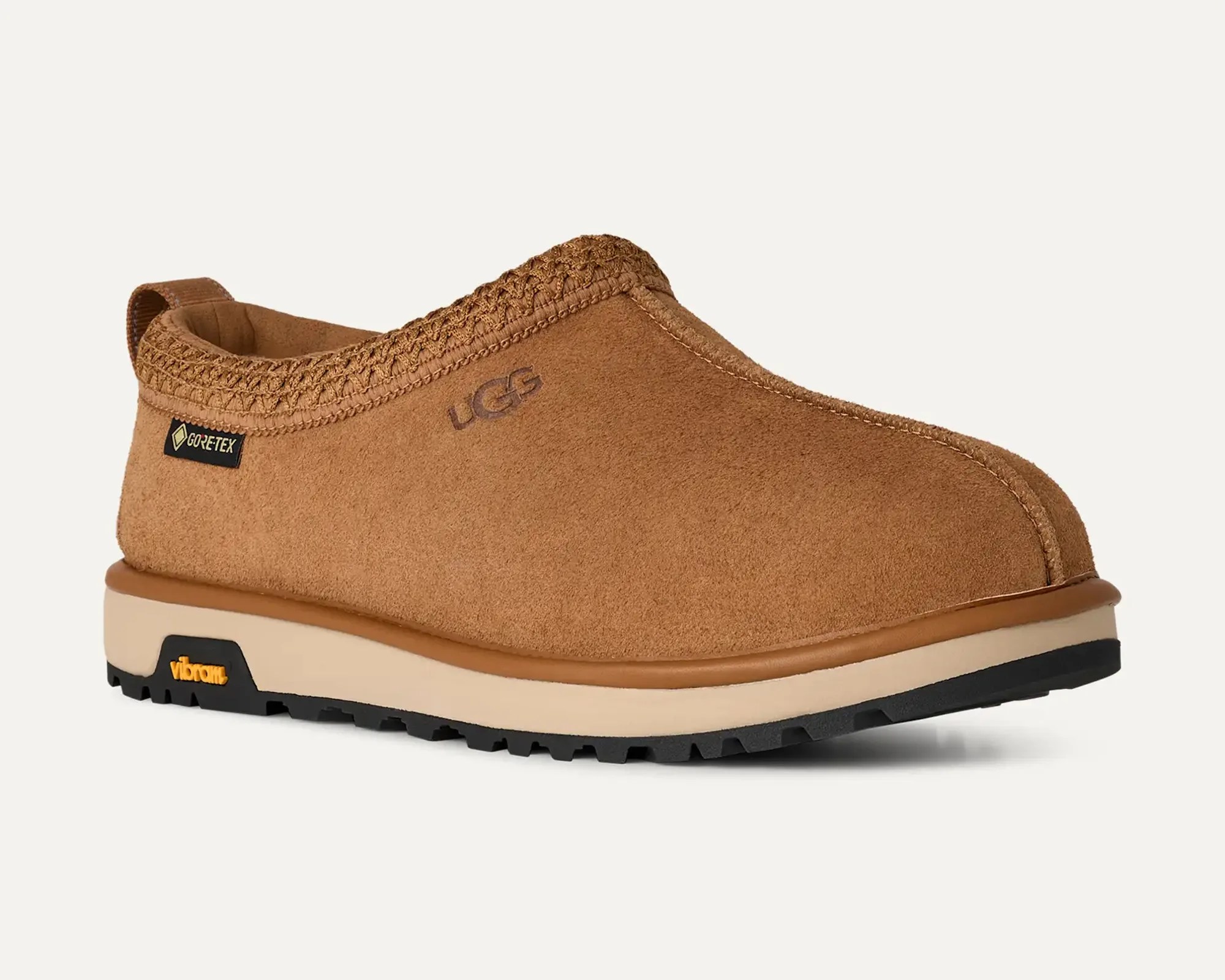 Chestnut suede slip-on shoe with Vibram sole and Gore-Tex tag, featuring UGG logo on the side.