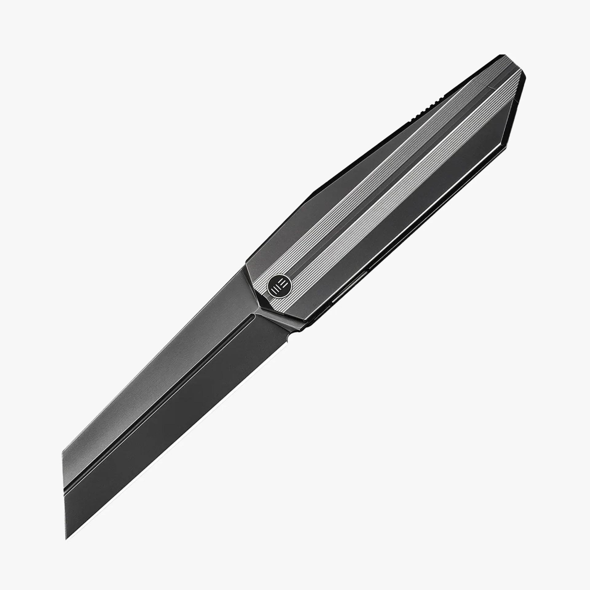 Black and silver metal utility knife with a straight blade and ridged handle.