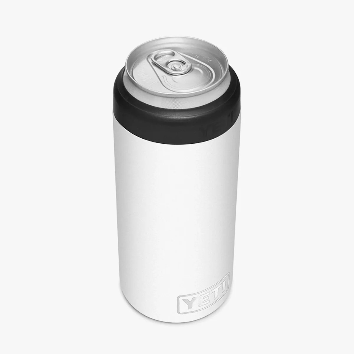 White YETI insulated can cooler with black top holding a silver soda can.