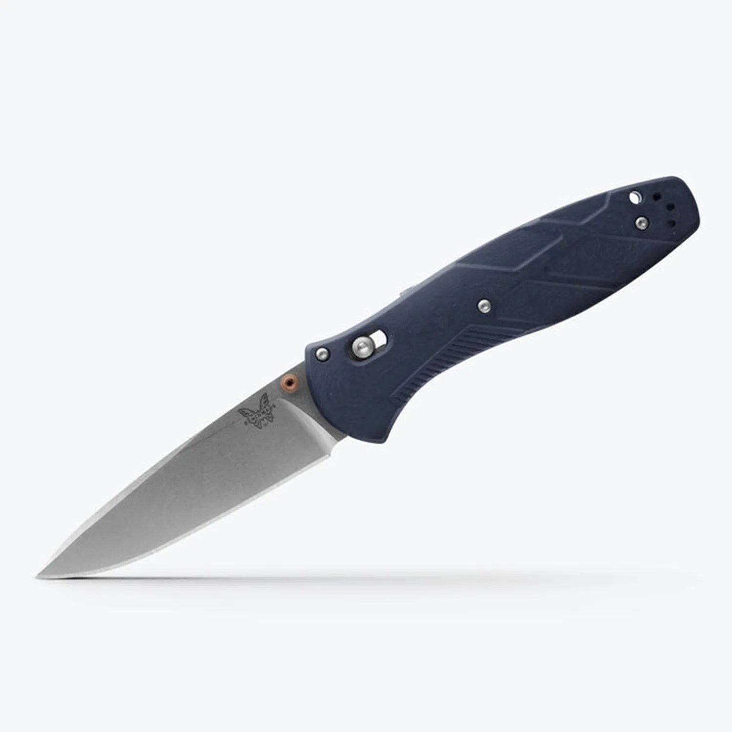 Folding knife with a stonewashed stainless steel blade and textured dark blue handle.
