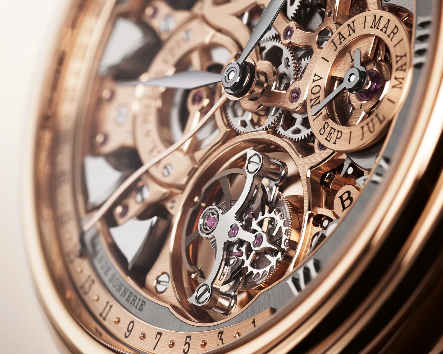 Close-up of a luxury skeleton watch with rose gold gears, silver hands, and a month indicator dial.