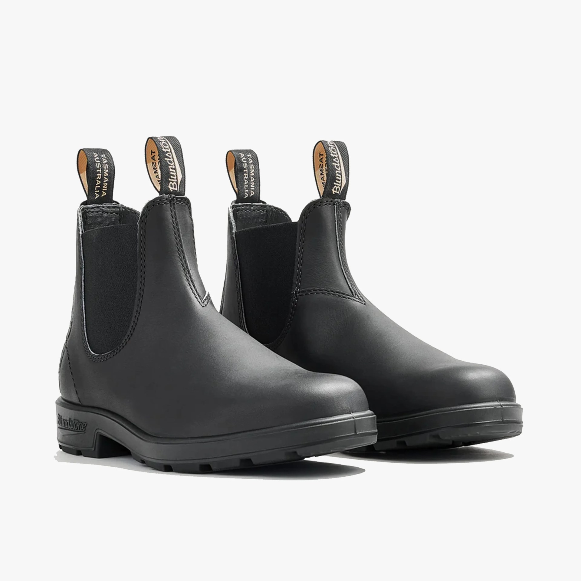 Pair of black leather Chelsea boots with elastic side panels and branded pull tabs.