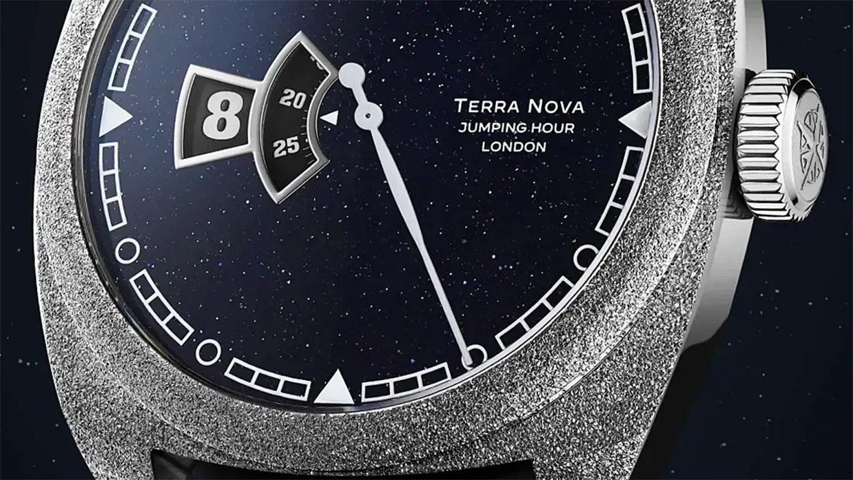 Close-up of a Terra Nova Jumping Hour London watch with a textured silver case and dark starry dial.