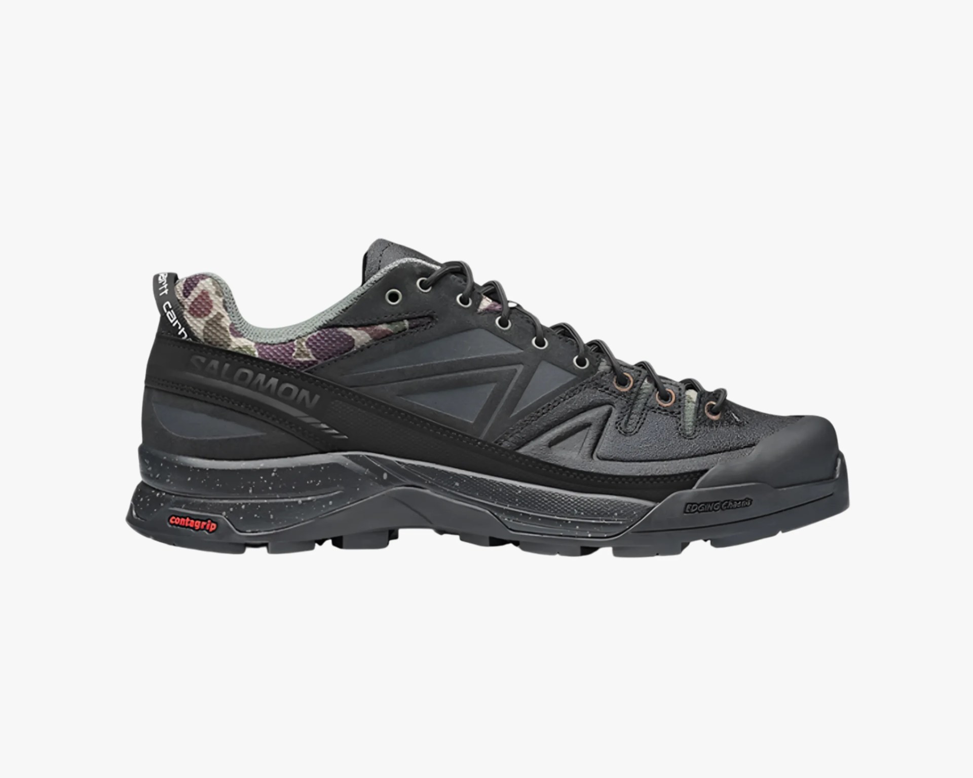 Black and gray Salomon hiking shoe with camouflage-patterned inner lining and speckled sole.