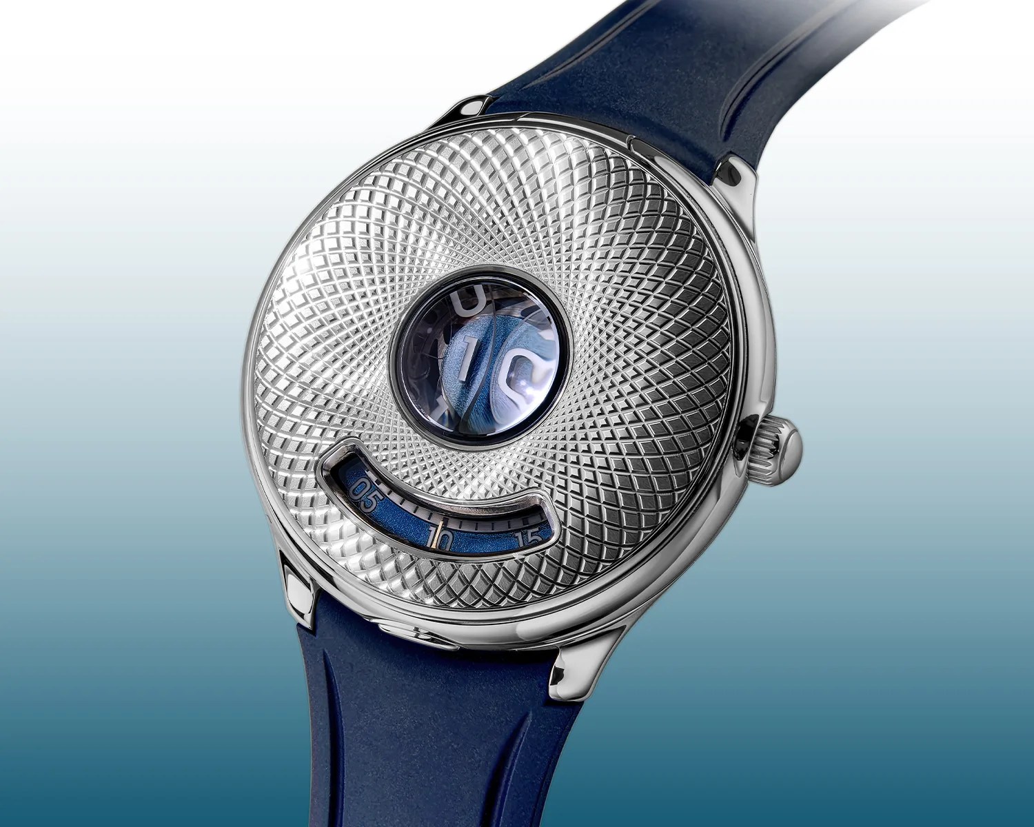 Silver textured watch face with circular window and blue digital time display, paired with a blue rubber strap.