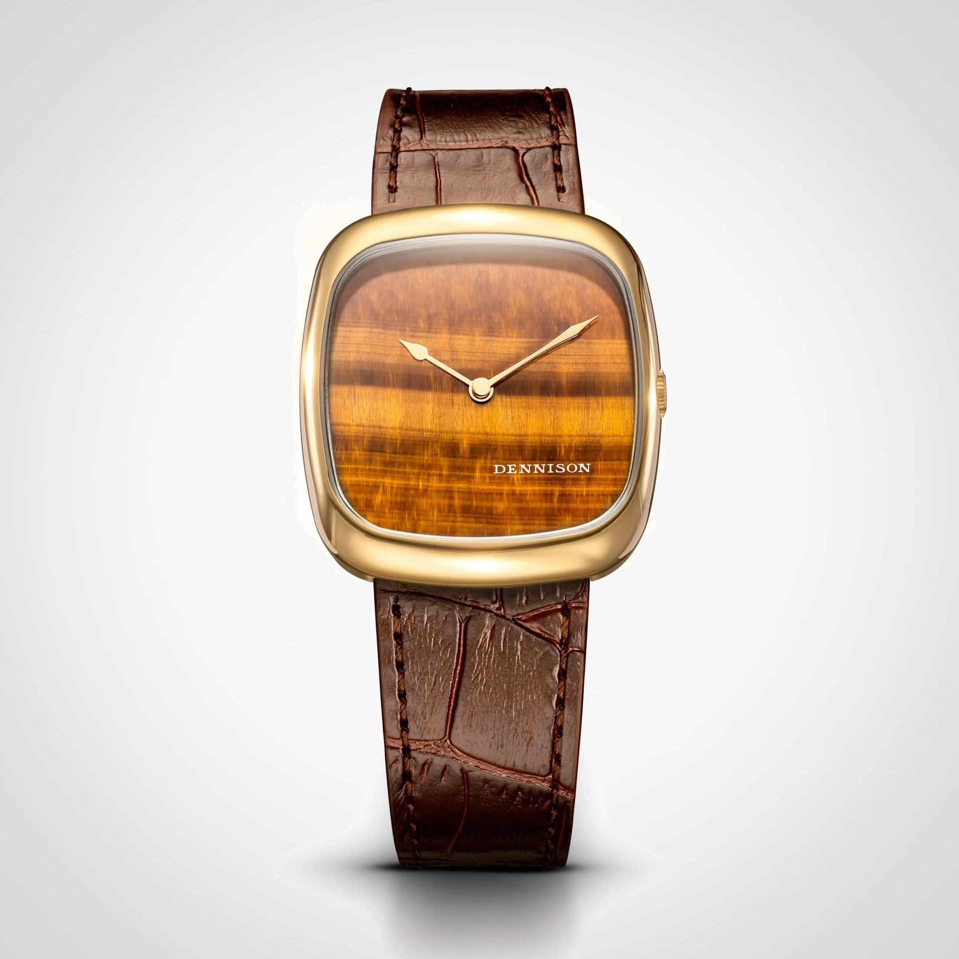 Square gold wristwatch with a brown tiger's eye dial and brown leather strap.