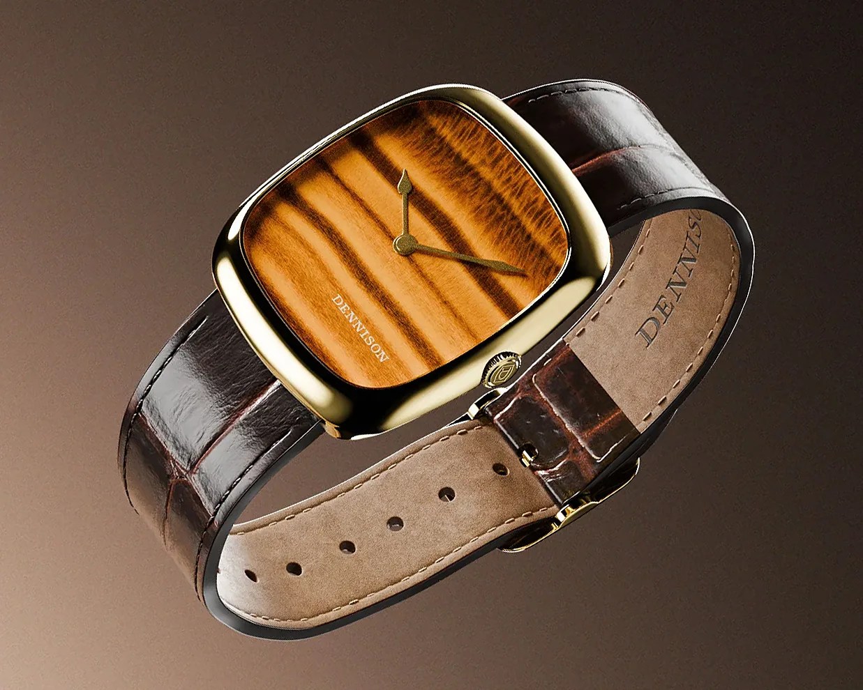 Gold-toned watch with a wood-grain face and brown leather strap embossed with "DENNISON".