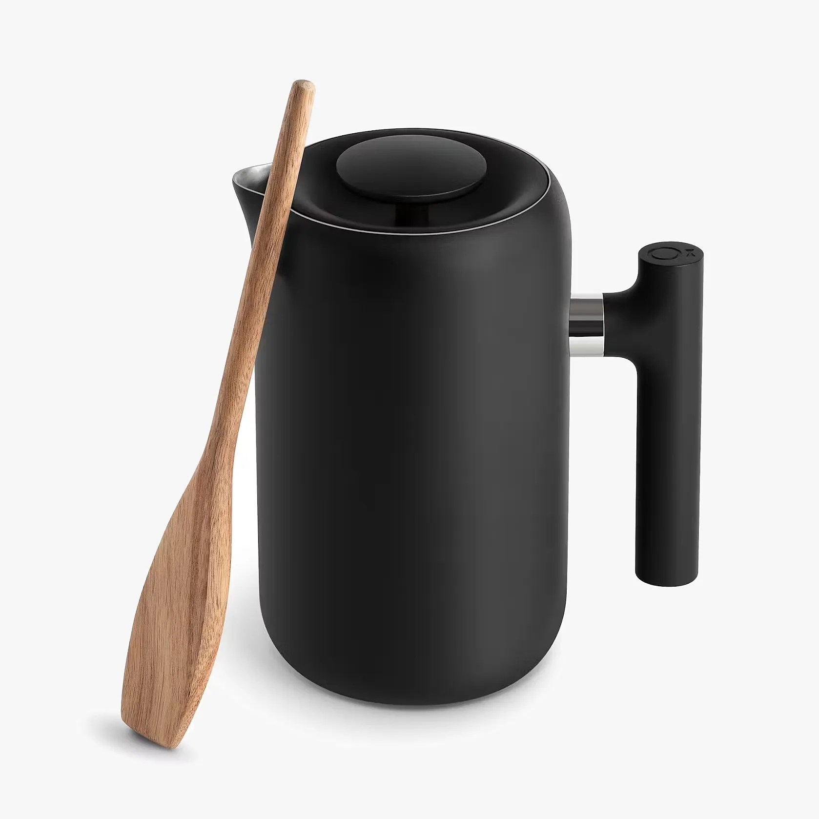 Matte black French press coffee maker with a cylindrical handle and a wooden paddle resting beside it.