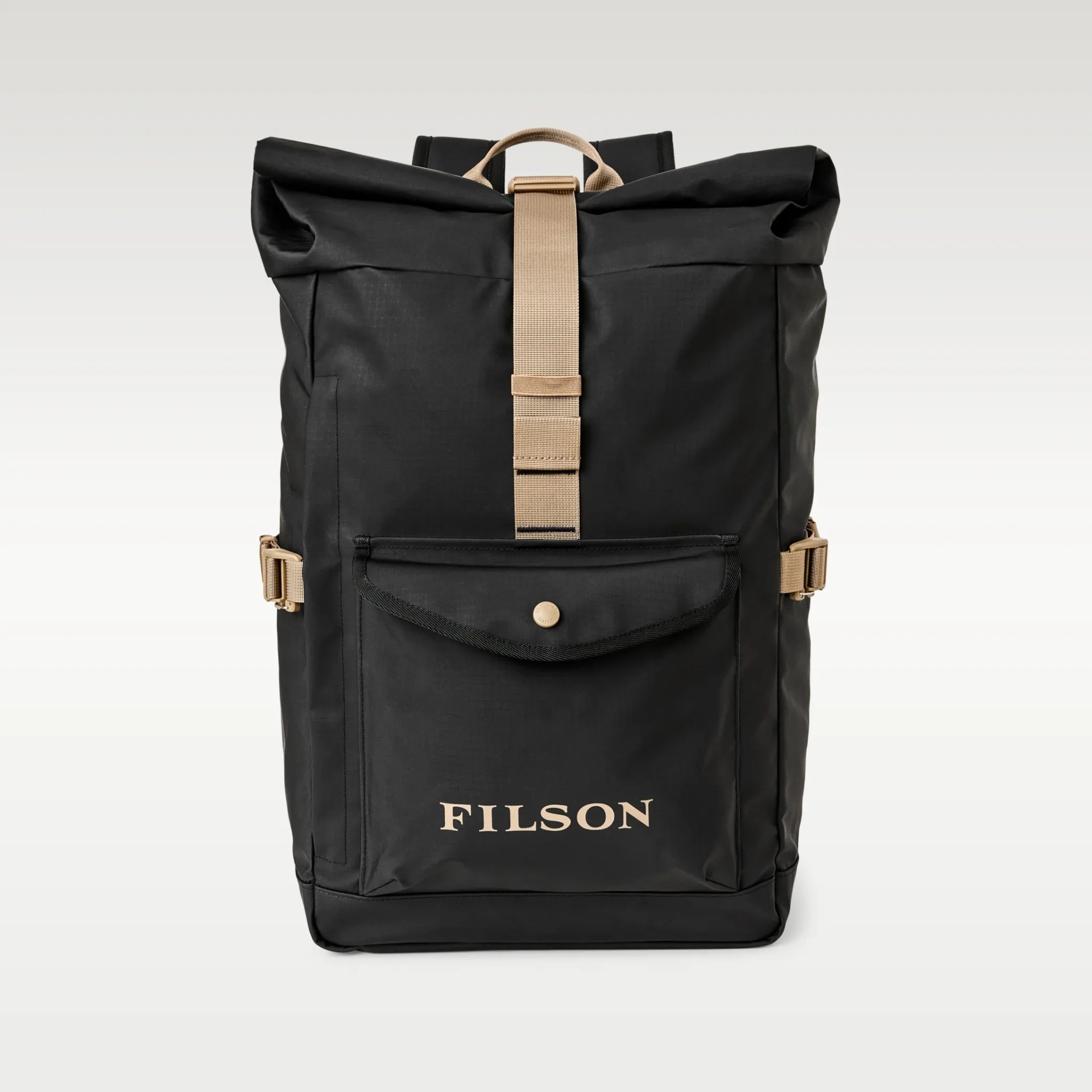 Black roll-top backpack with beige strap and front pocket featuring "FILSON" logo.