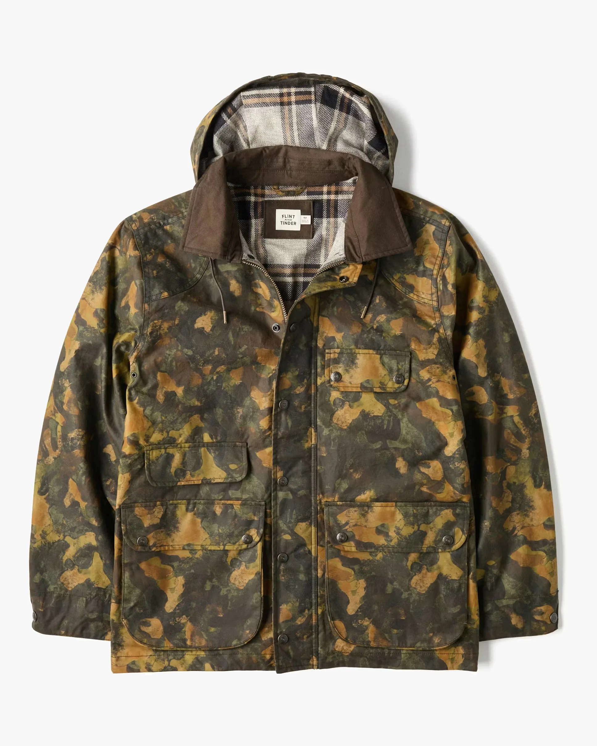 Camouflage-patterned hooded jacket with brown collar and plaid lining, featuring multiple front pockets.