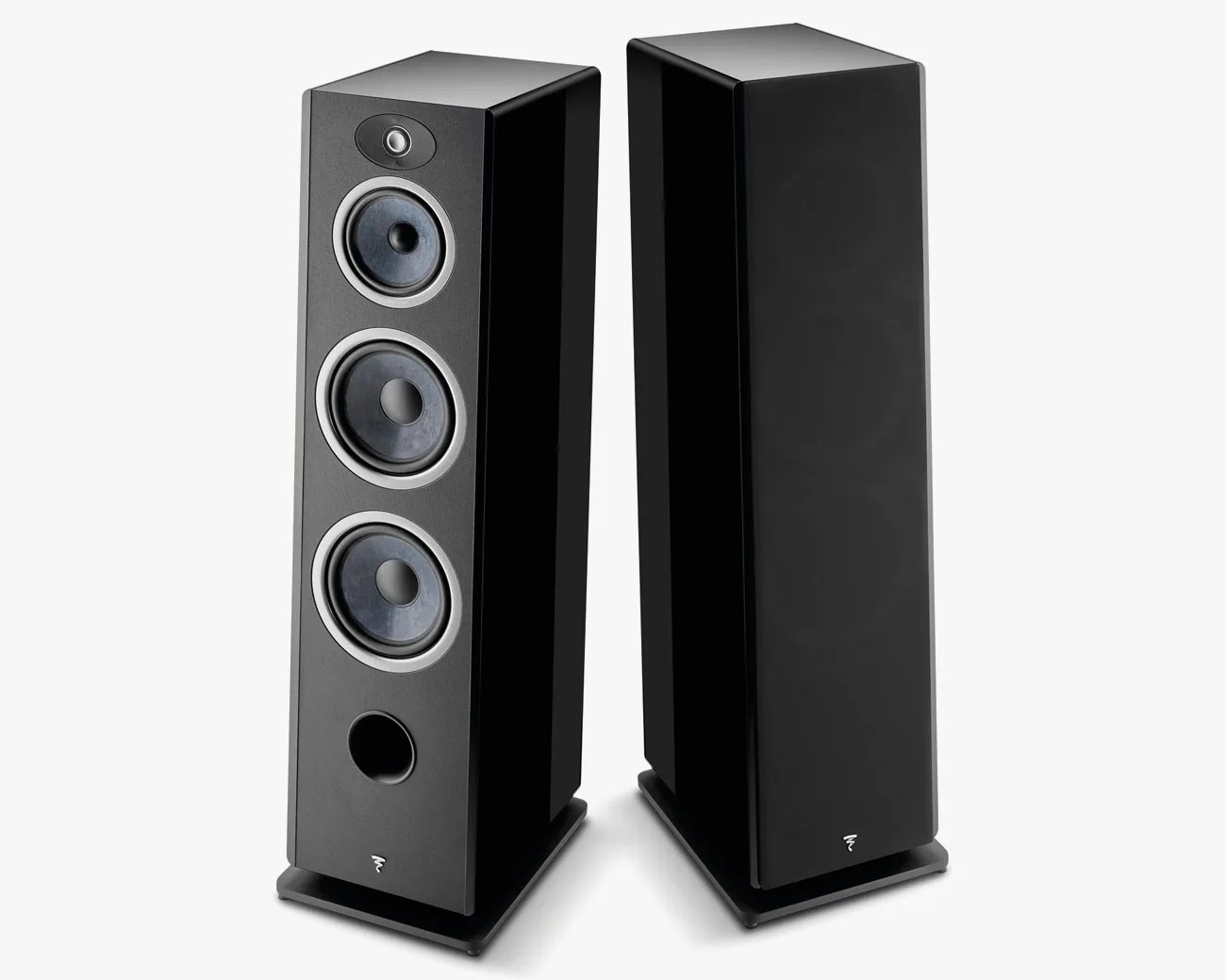 Pair of tall black floor-standing speakers, one with visible drivers and one with a black grille cover.