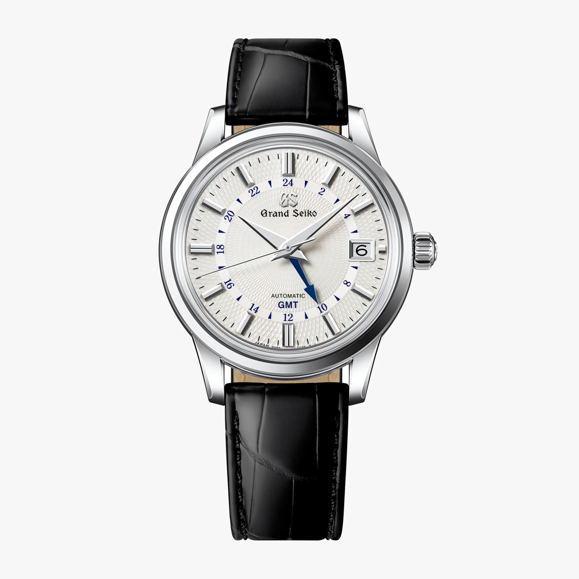 Silver Grand Seiko GMT watch with textured white dial, blue GMT hand, and black leather strap.