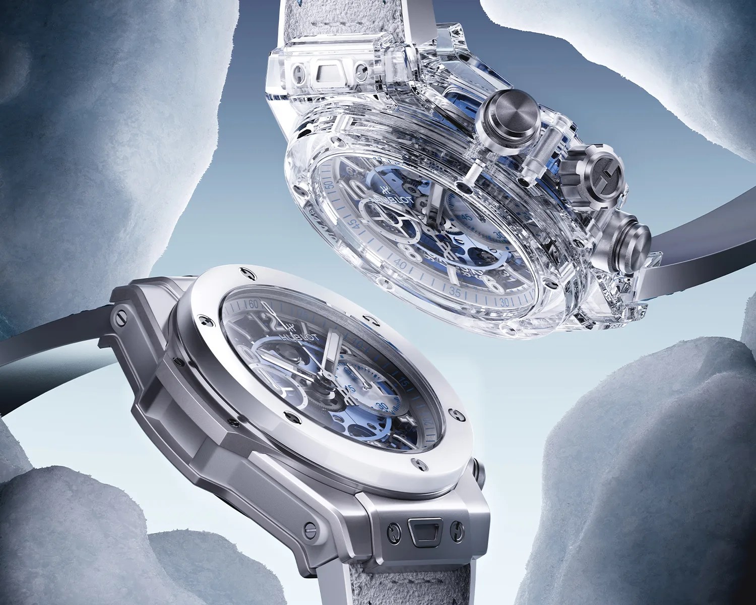 Two luxury wristwatches with transparent and silver cases, visible gears, and grey straps against a blue icy background.