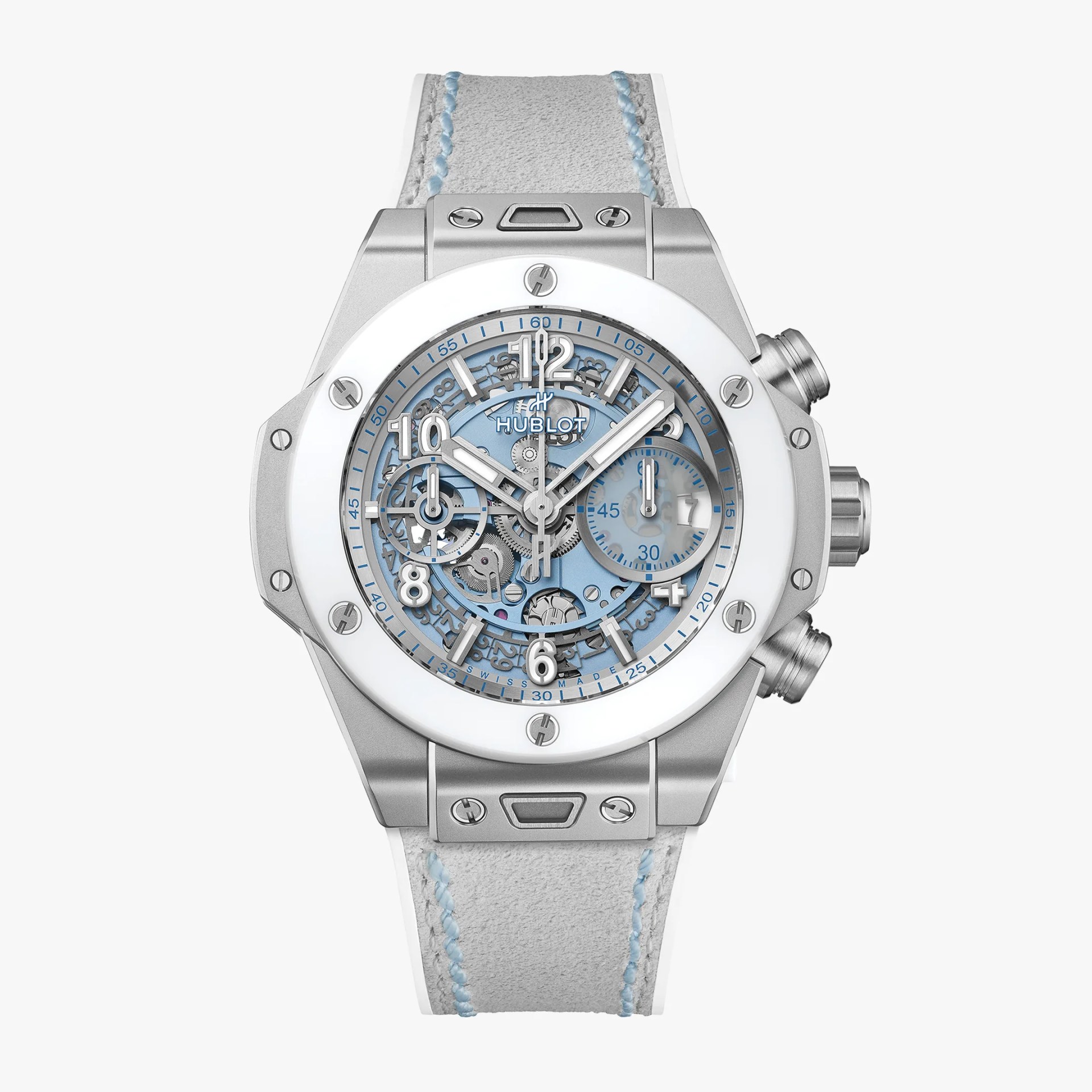 Silver Hublot chronograph watch with light blue skeleton dial and light gray strap with blue stitching.
