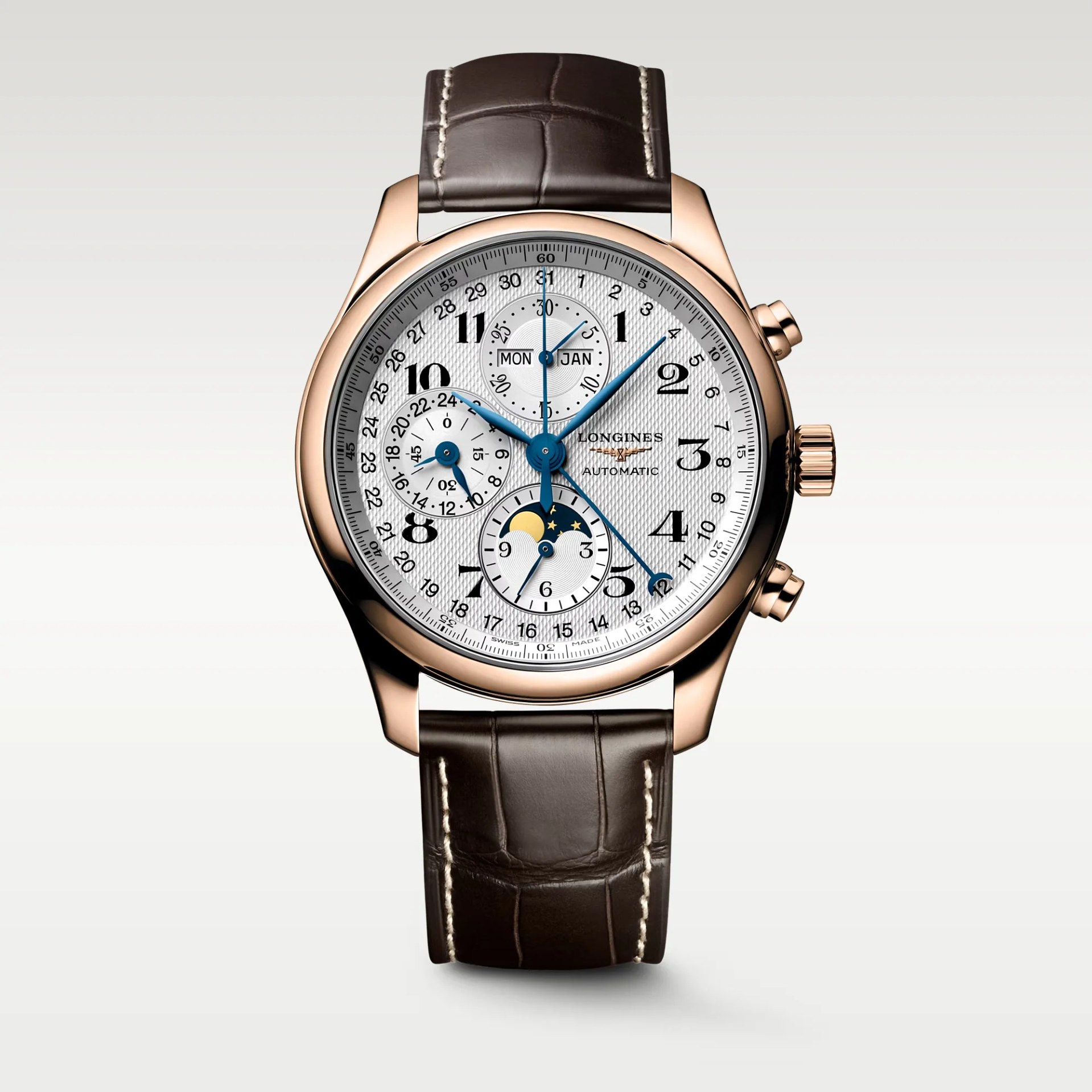Rose gold Longines automatic watch with white textured dial, blue hands, moon phase, and brown leather strap.
