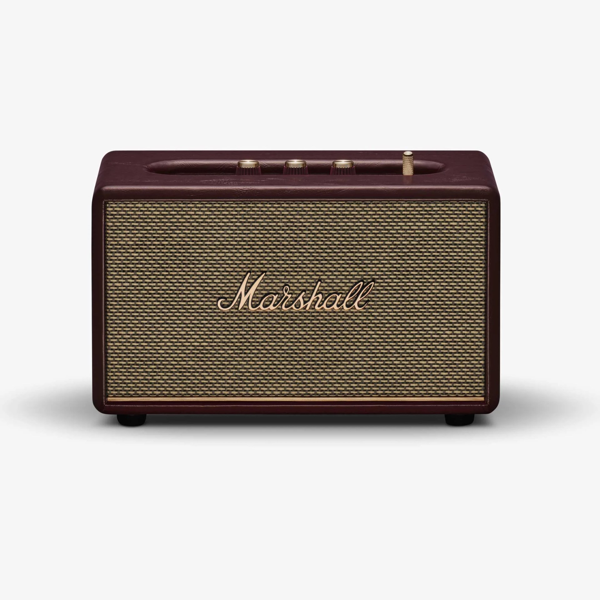 Compact rectangular Marshall speaker with brown leather casing and woven front grille with logo.
