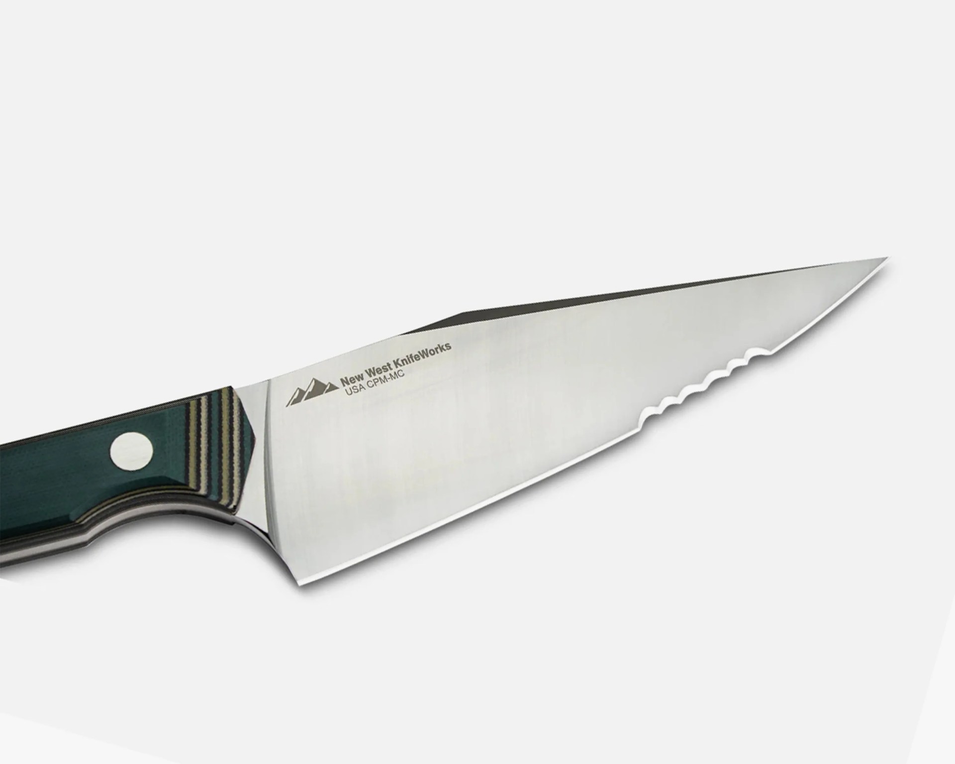 Knife with partially serrated stainless steel blade and green layered handle with metal rivet.