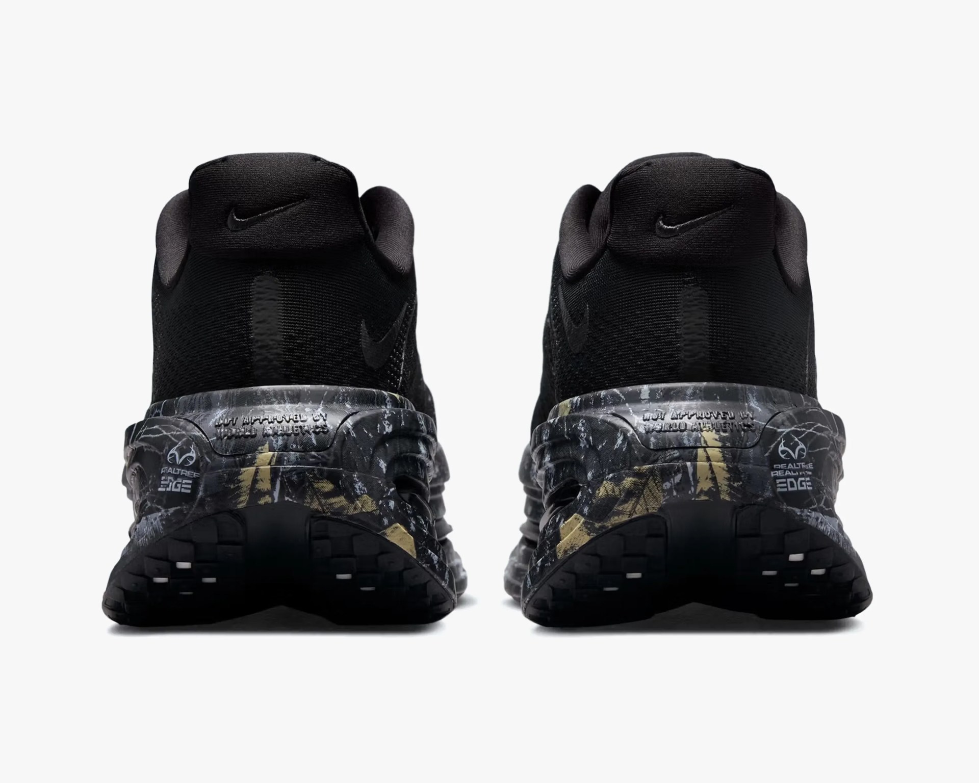 Pair of black Nike running shoes with camo-patterned midsoles shown from the back.