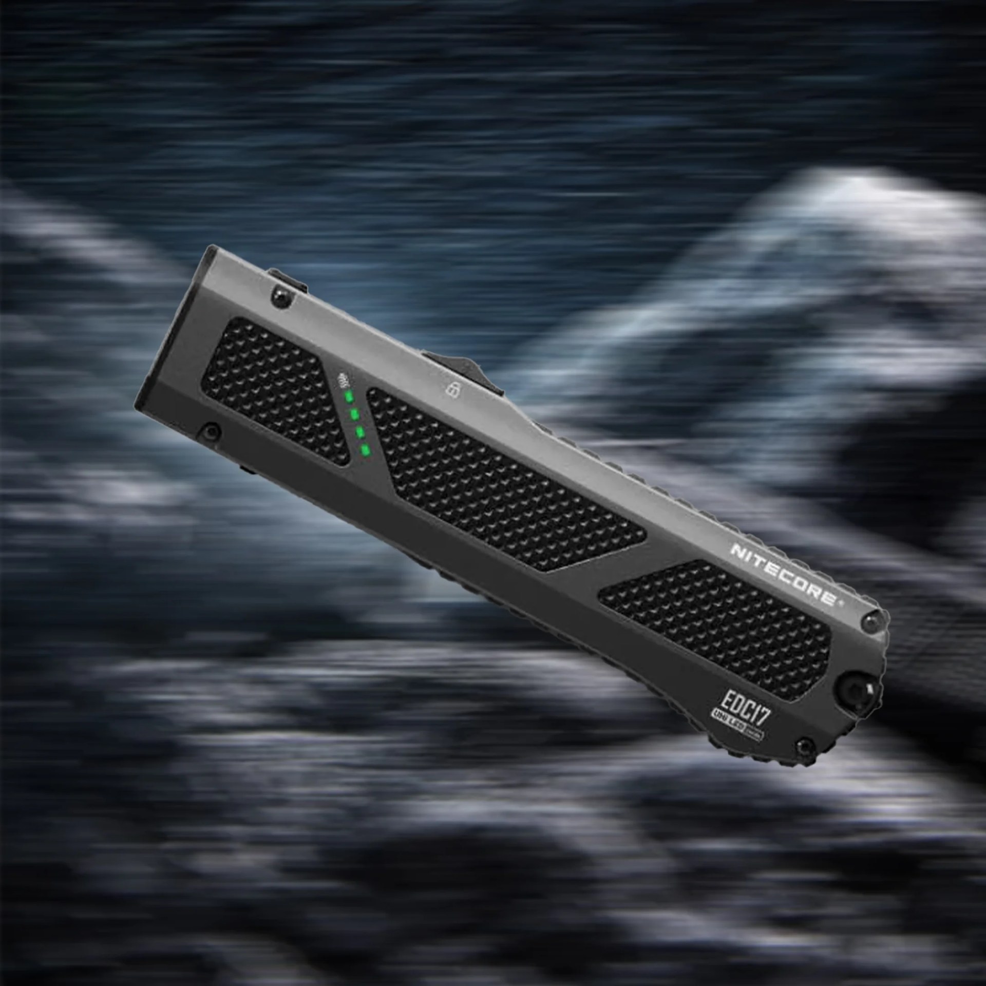 Black and gray Nitecore EDC17 portable power bank with textured grip and green LED indicators.