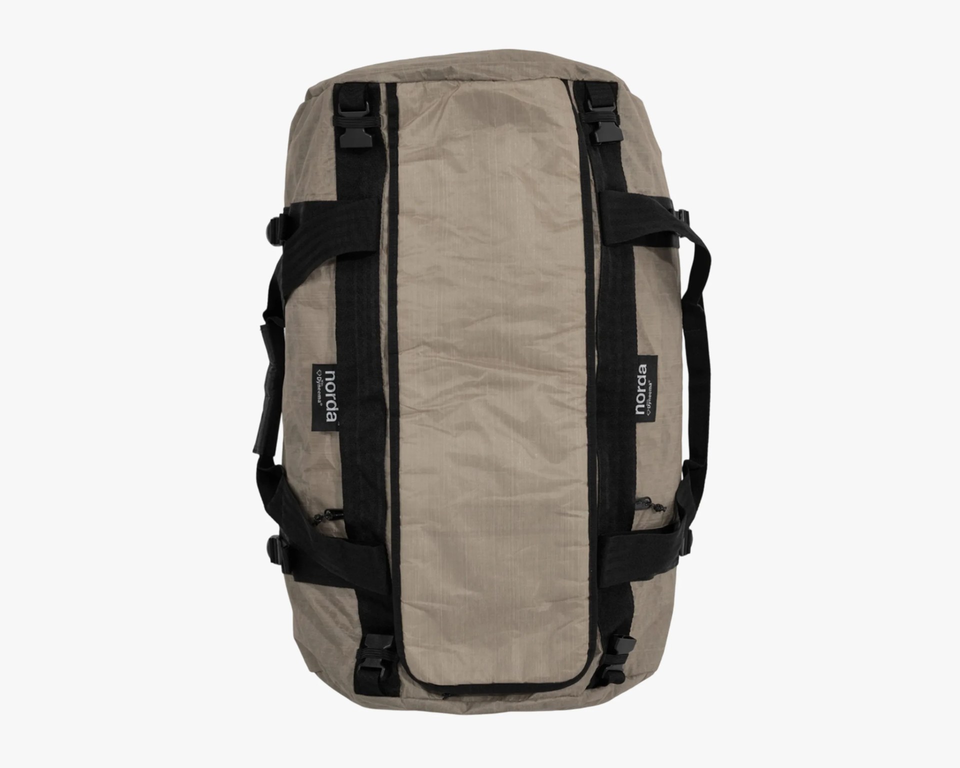 Beige and black Norda duffel bag with multiple straps and buckles on a white background.