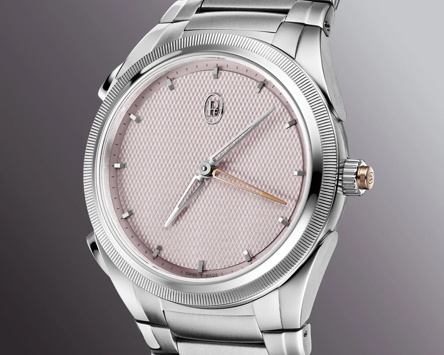 Silver stainless steel wristwatch with a textured light pink dial.