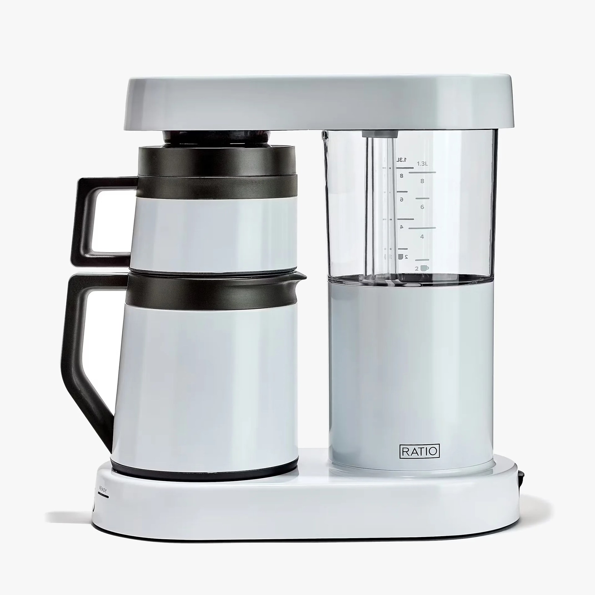 White and black Ratio coffee maker with glass water reservoir and two stacked carafes.