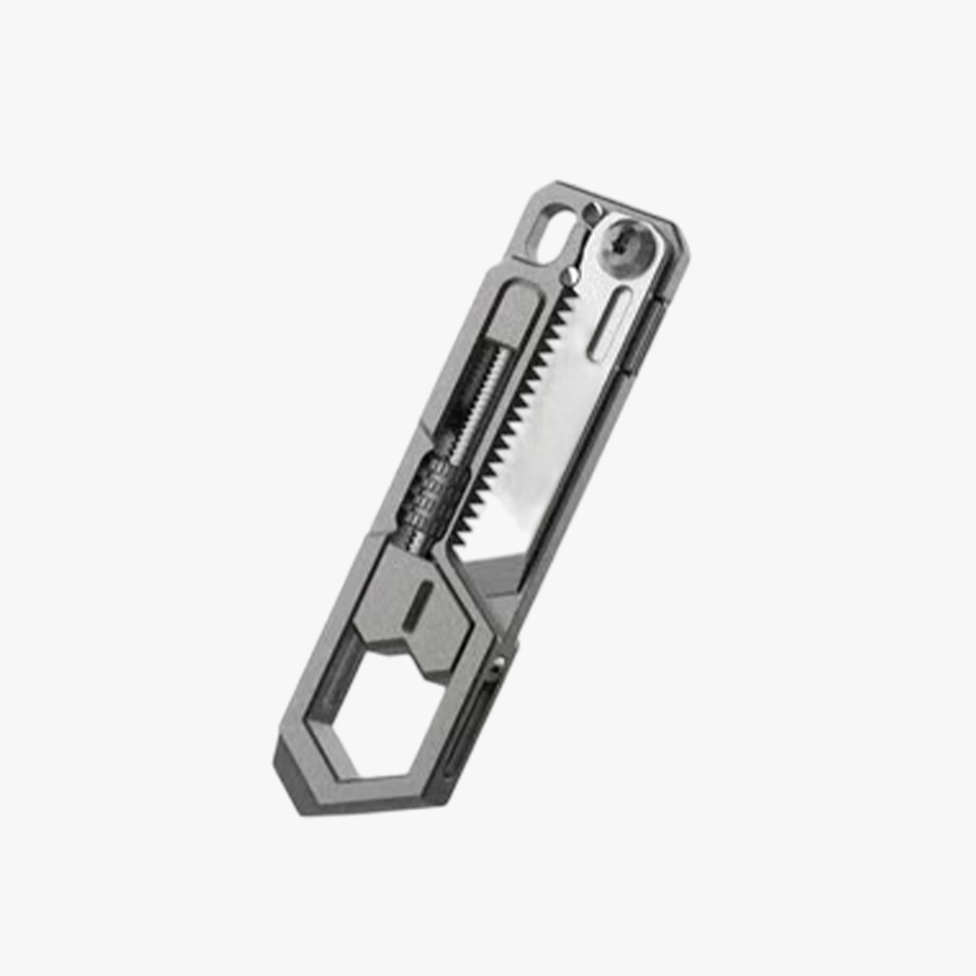Compact gray multi-tool with a saw blade, wrench, and screwdriver bit.