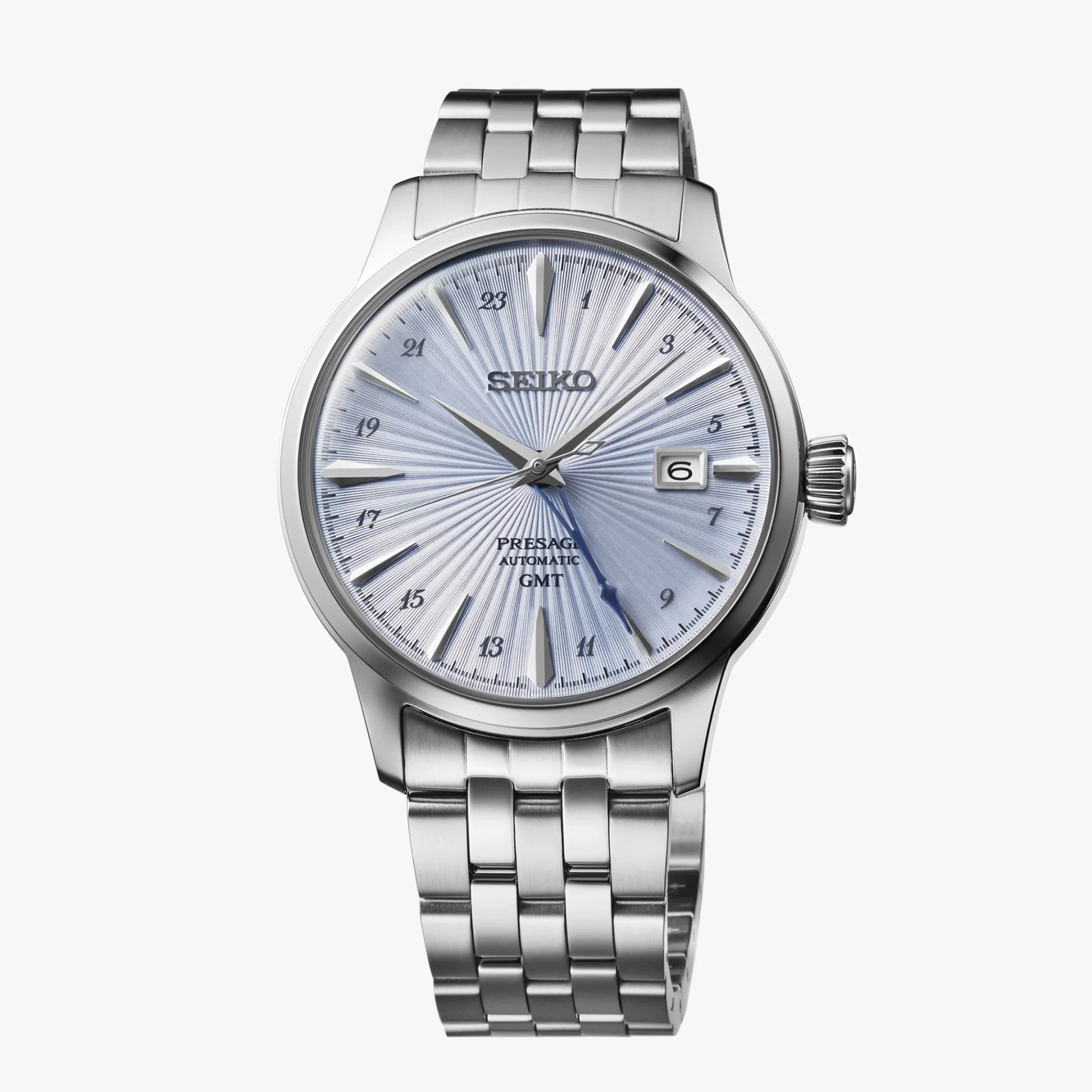 Silver Seiko Presage automatic GMT watch with textured light blue dial and metal link bracelet.