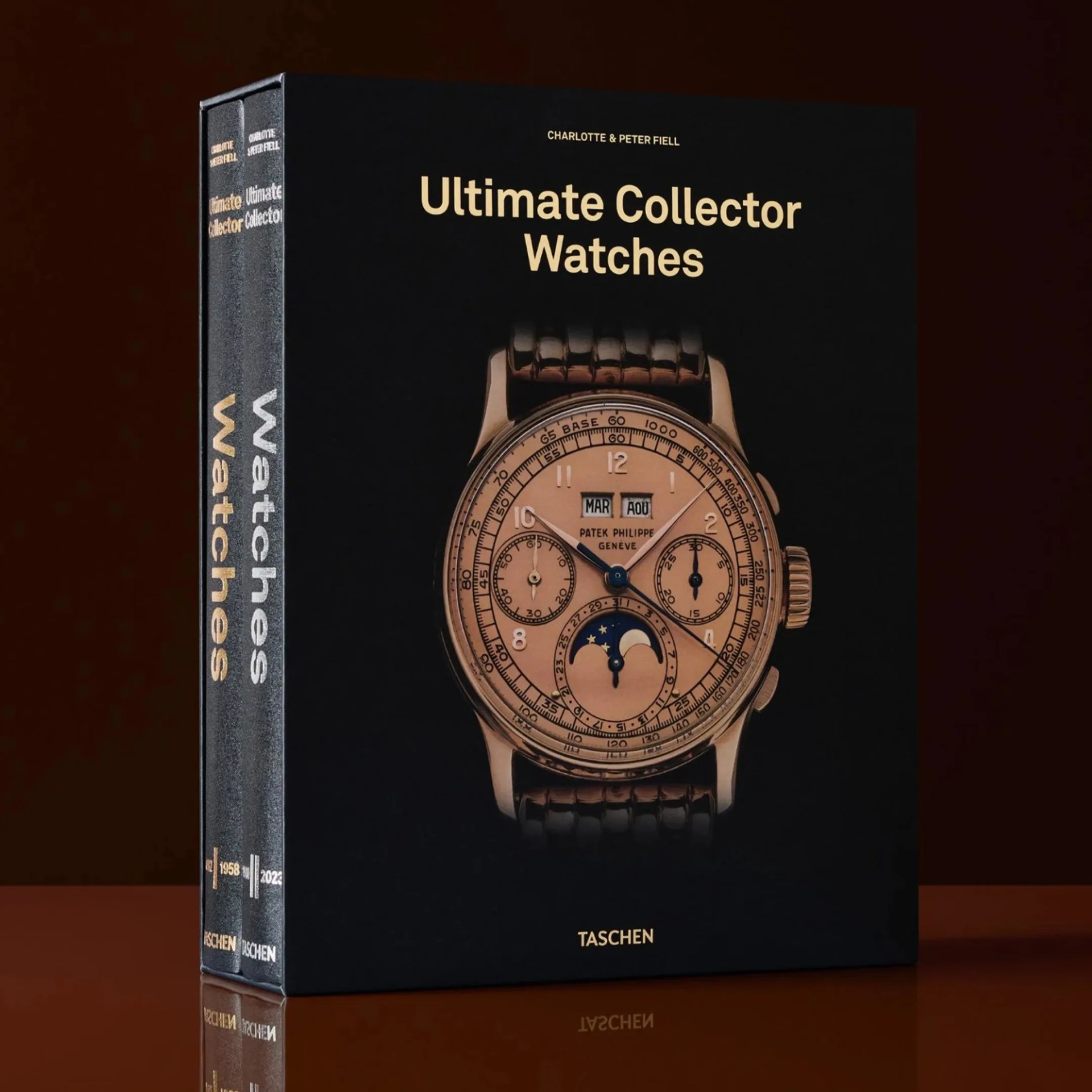 Two-volume book set titled "Ultimate Collector Watches" by Charlotte & Peter Fiell, featuring a detailed image of a Patek Philippe watch on the cover.