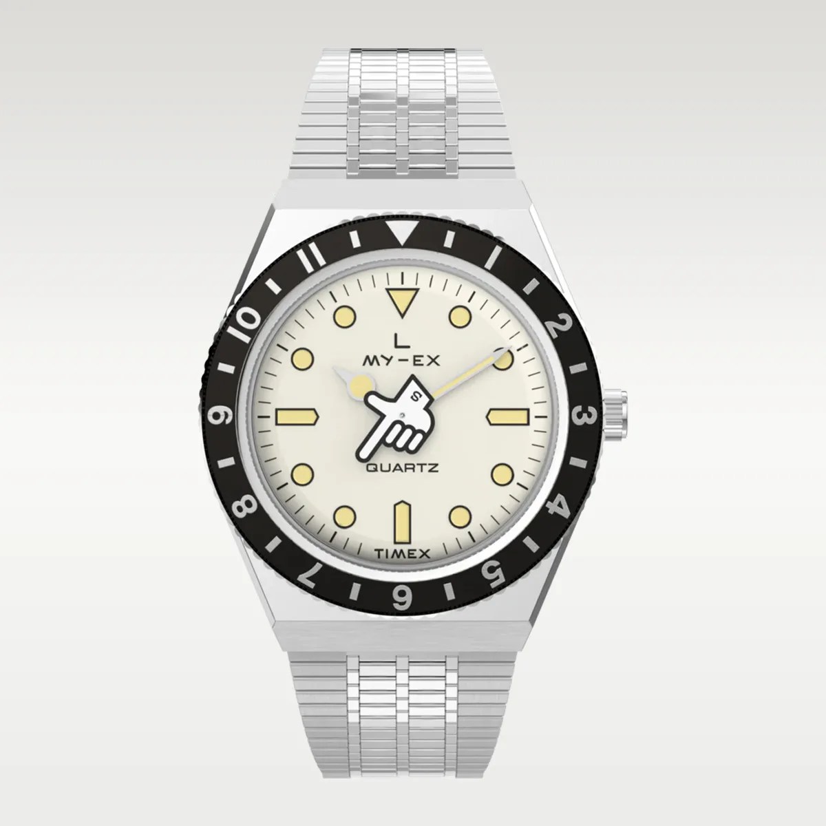 Silver metal wristwatch with cream dial, black bezel, and a hand-shaped hour hand pointing at 10 o'clock.