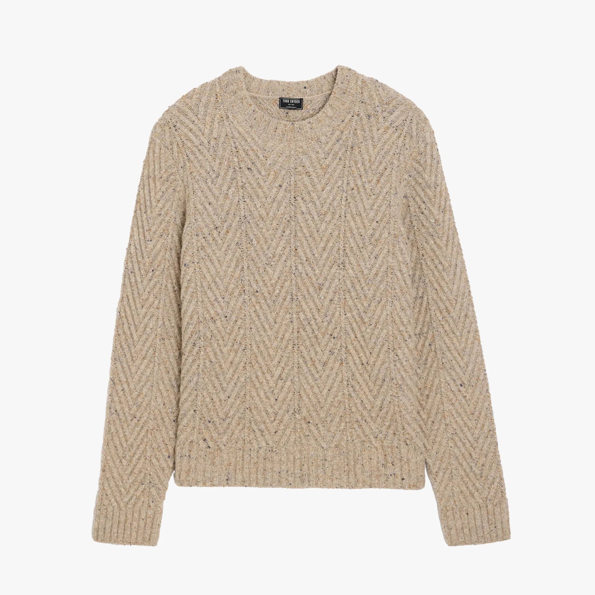 Beige cable-knit wool sweater with a crew neckline and ribbed cuffs and hem.