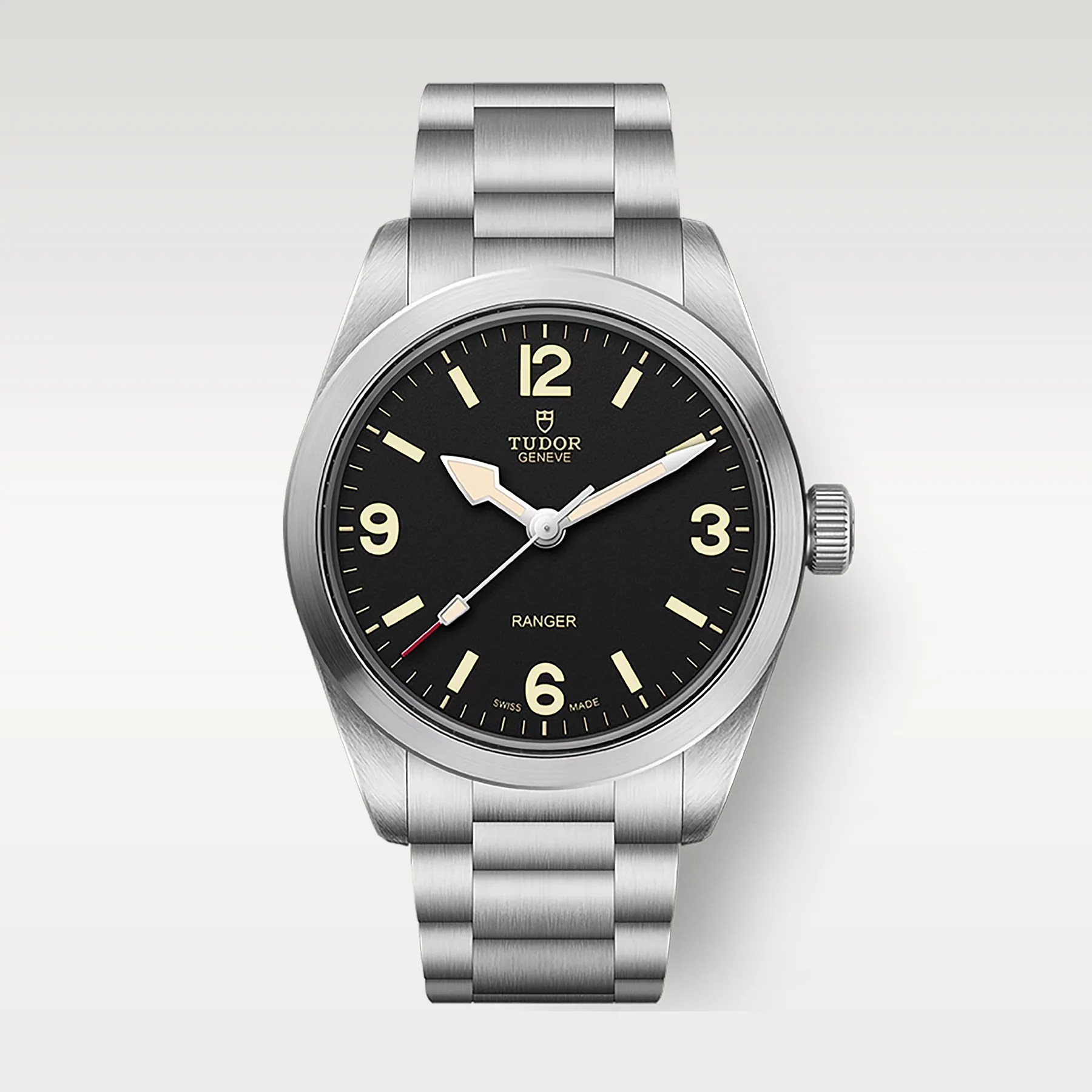 Stainless steel Tudor Ranger wristwatch with black dial and beige luminous hands and markers.