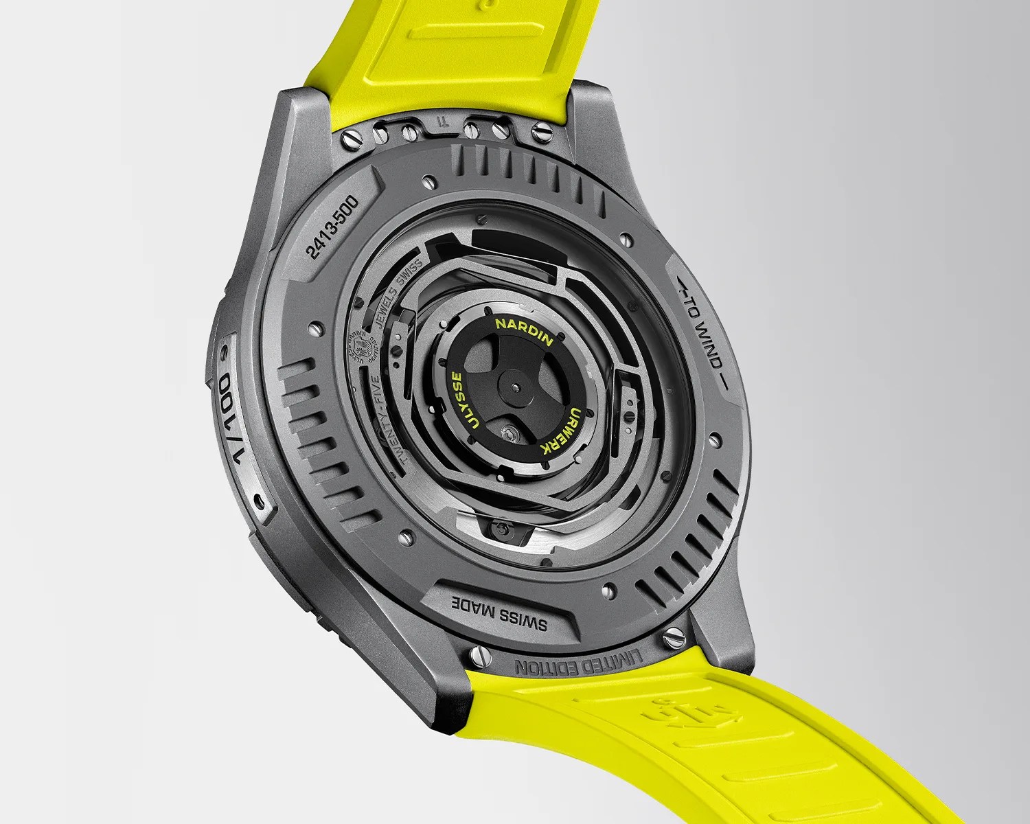 Back of a limited edition Swiss-made Ulysse Nardin watch with visible mechanical movement and bright yellow strap.