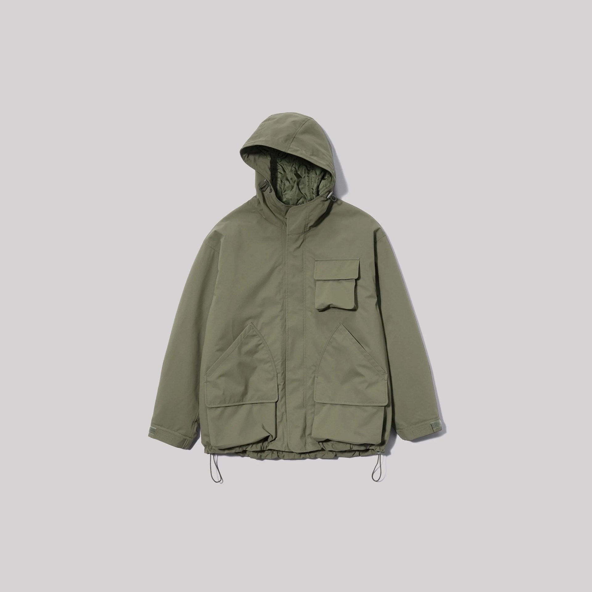 Olive green hooded jacket with multiple front flap pockets and adjustable hem cords.