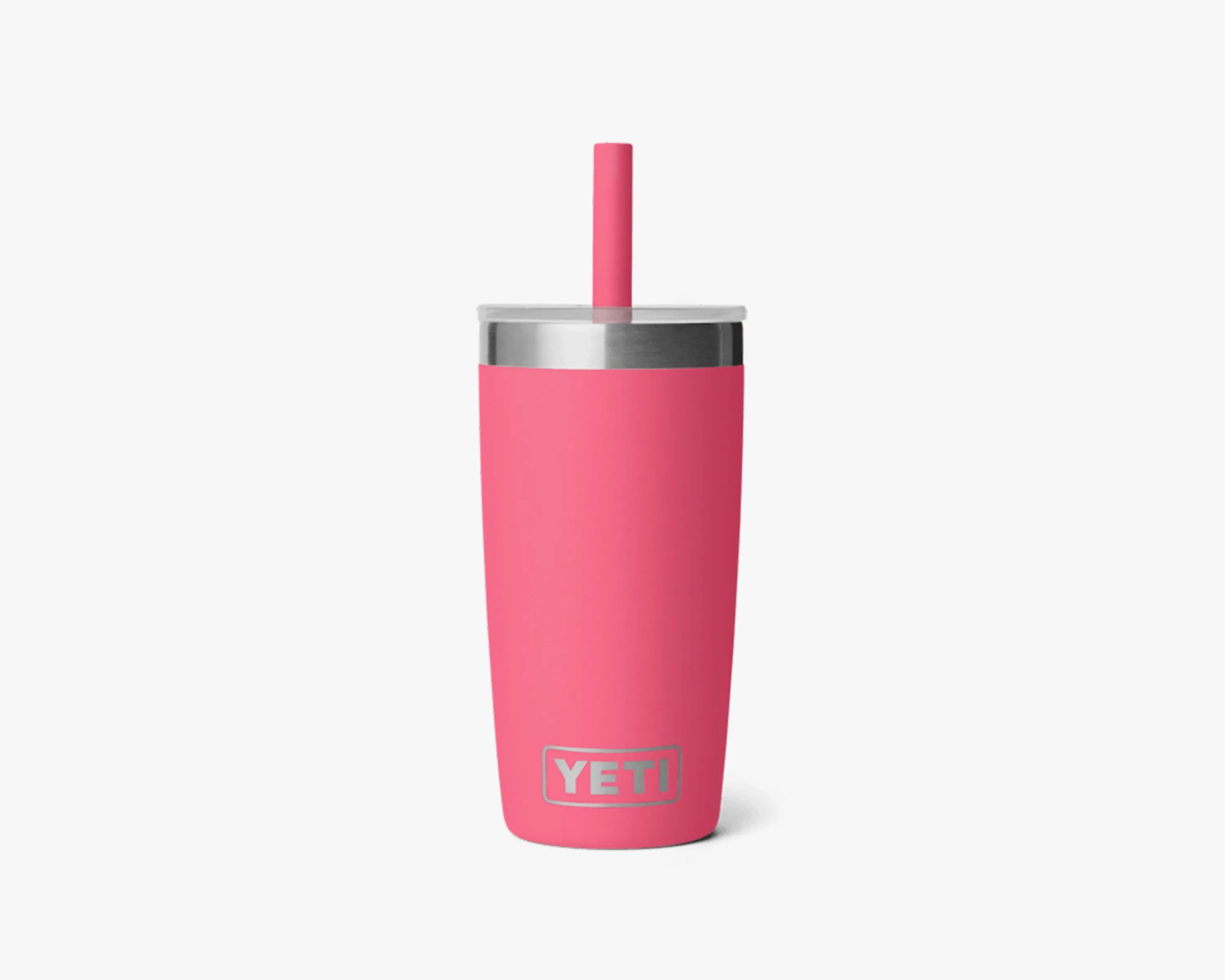 Pink YETI tumbler with stainless steel rim and matching pink straw on a white background.