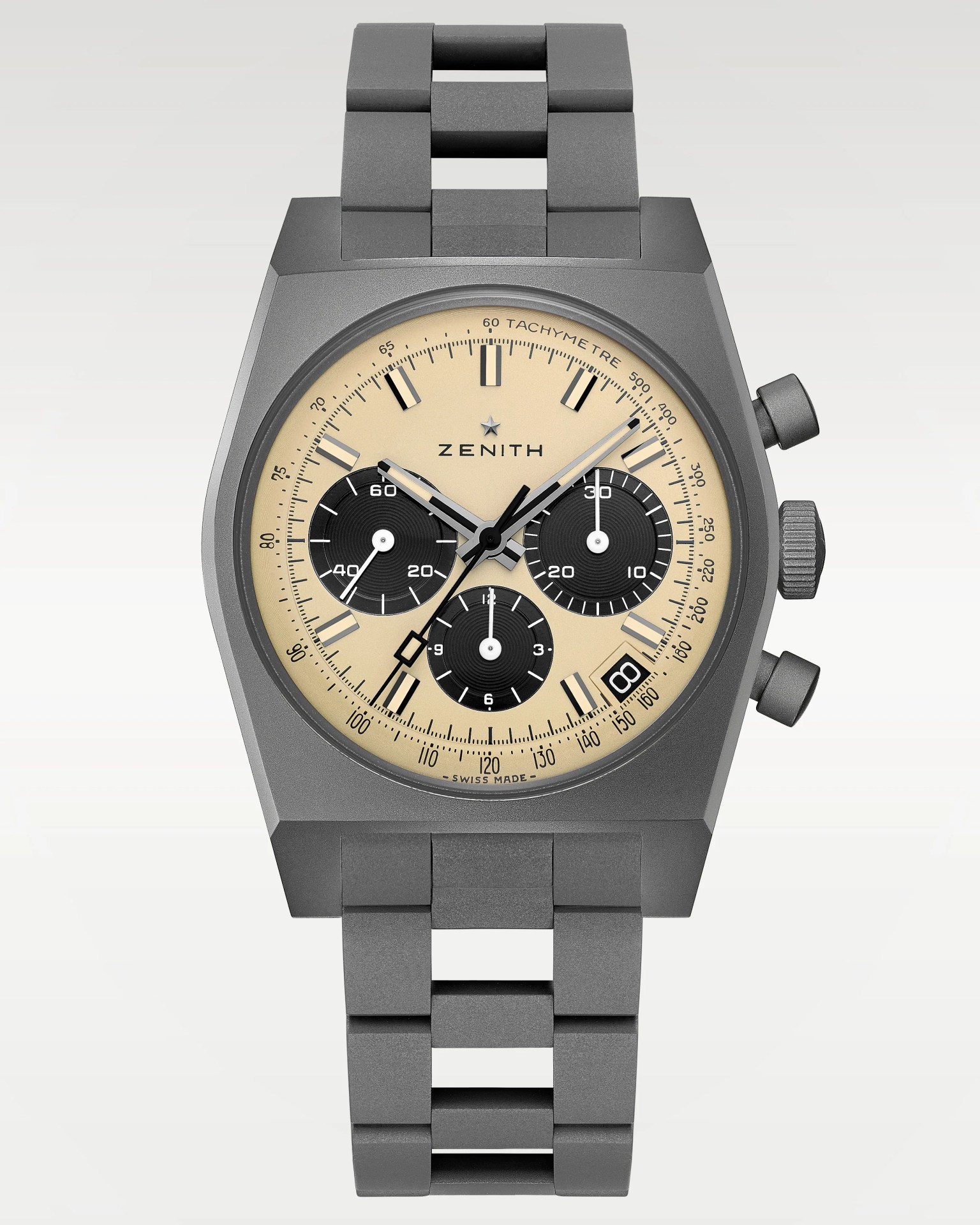 Matte gray metal Zenith wristwatch with beige dial, black subdials, tachymeter scale, and metal link bracelet.
