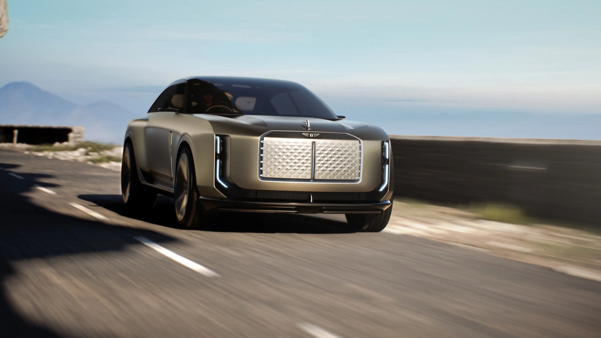 Matte olive-green luxury coupe with large silver grille and vertical LED headlights on a road.