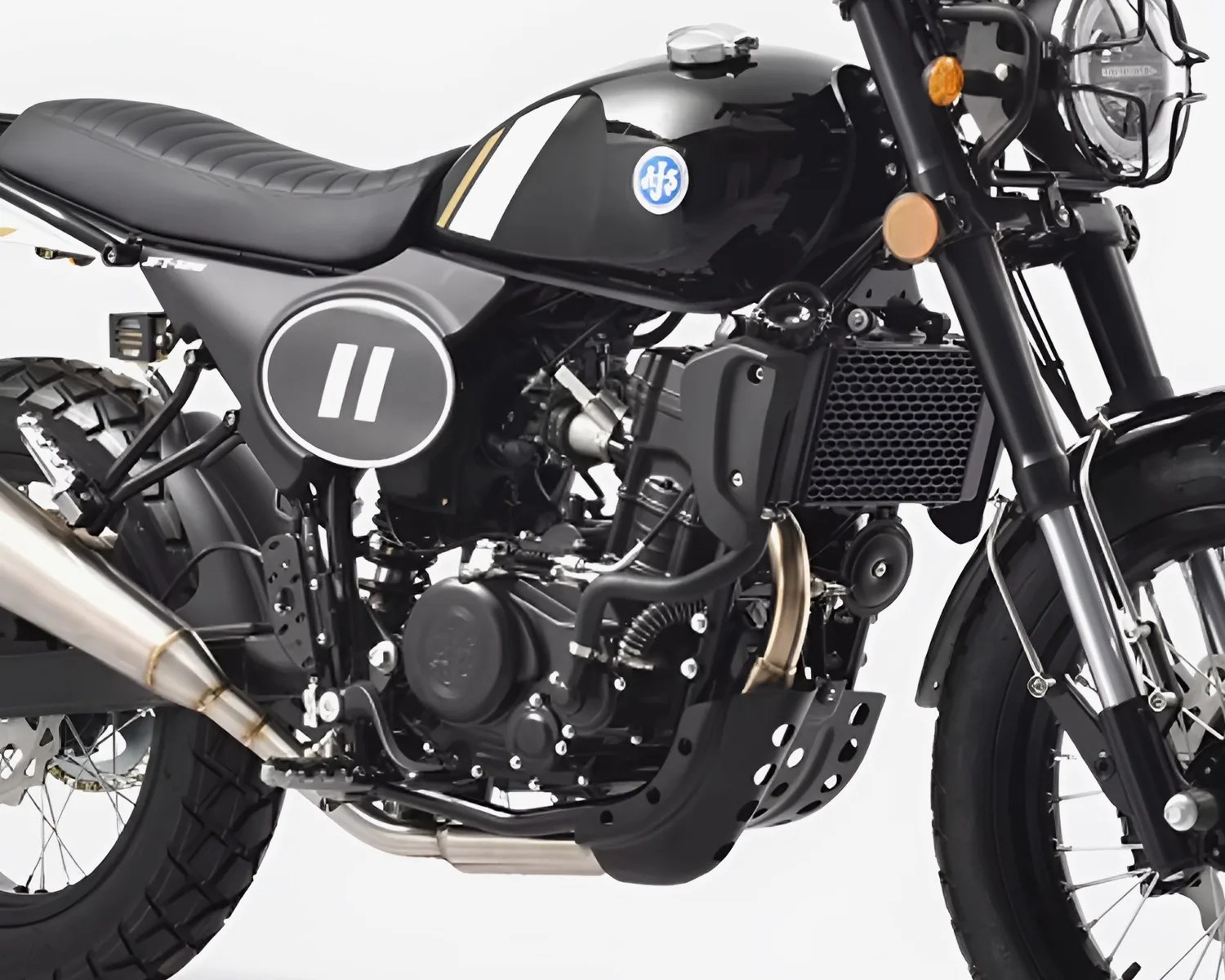 Black cafe racer-style motorcycle with a quilted seat, round number plate, and silver exhaust pipe.