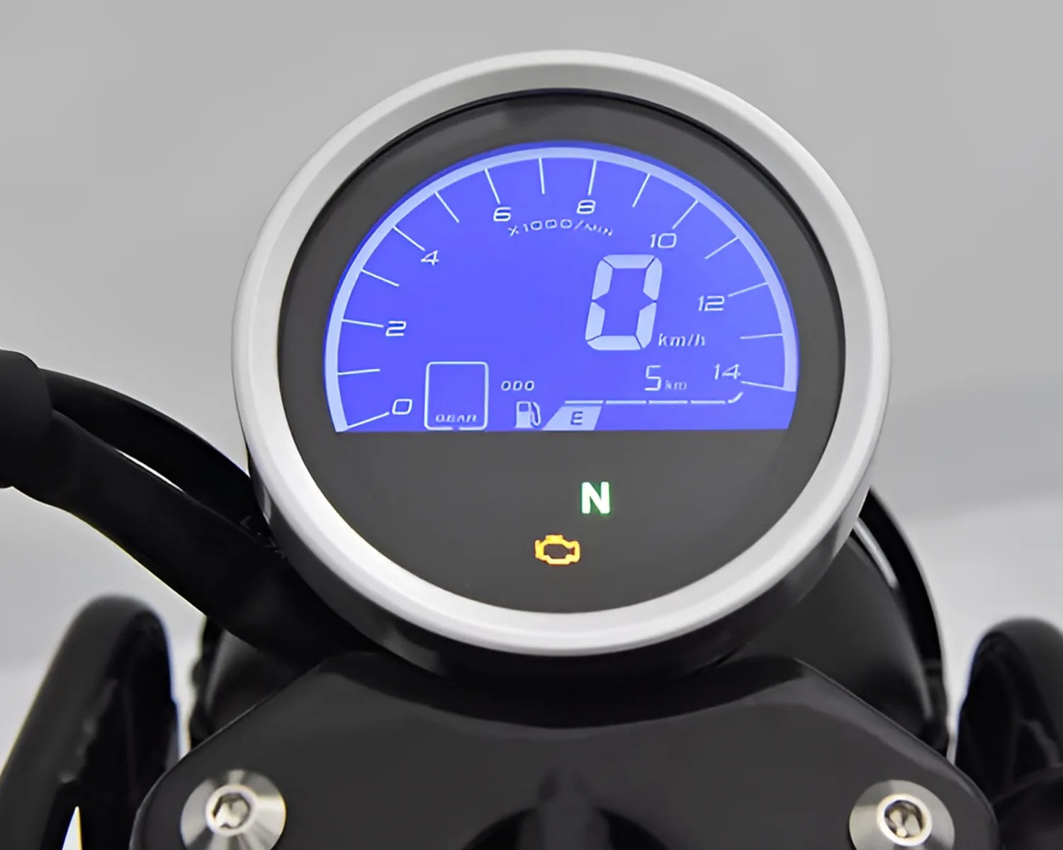 Round digital motorcycle speedometer with blue backlight showing zero speed, neutral gear indicator, and check engine light.