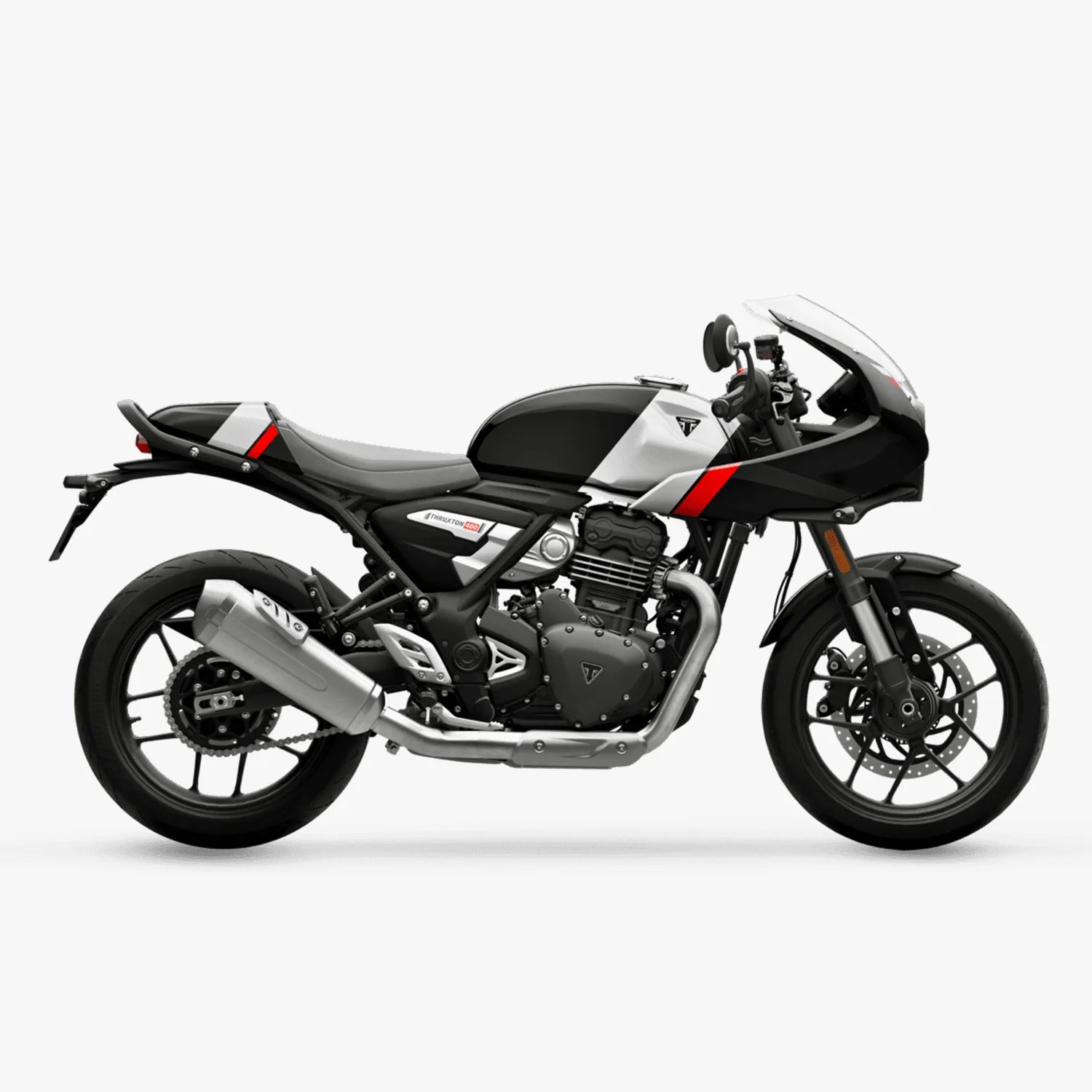 Black, white, and red Triumph Thruxton 1200 motorcycle with a silver exhaust and sporty fairing.