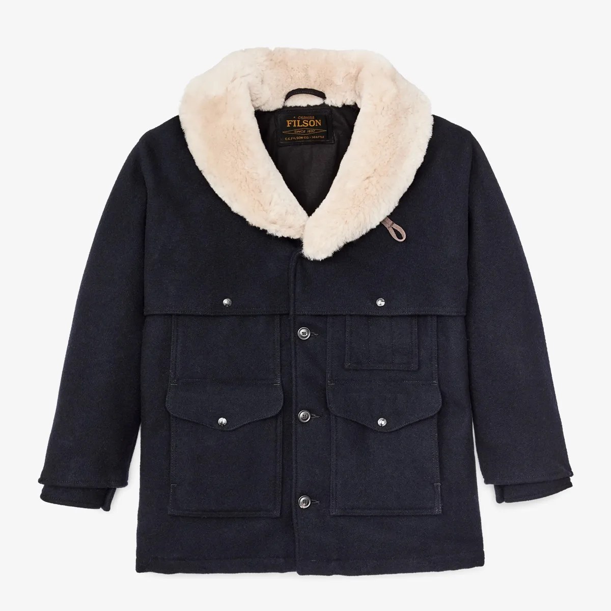 Navy blue wool jacket with large front pockets and cream-colored shearling collar.