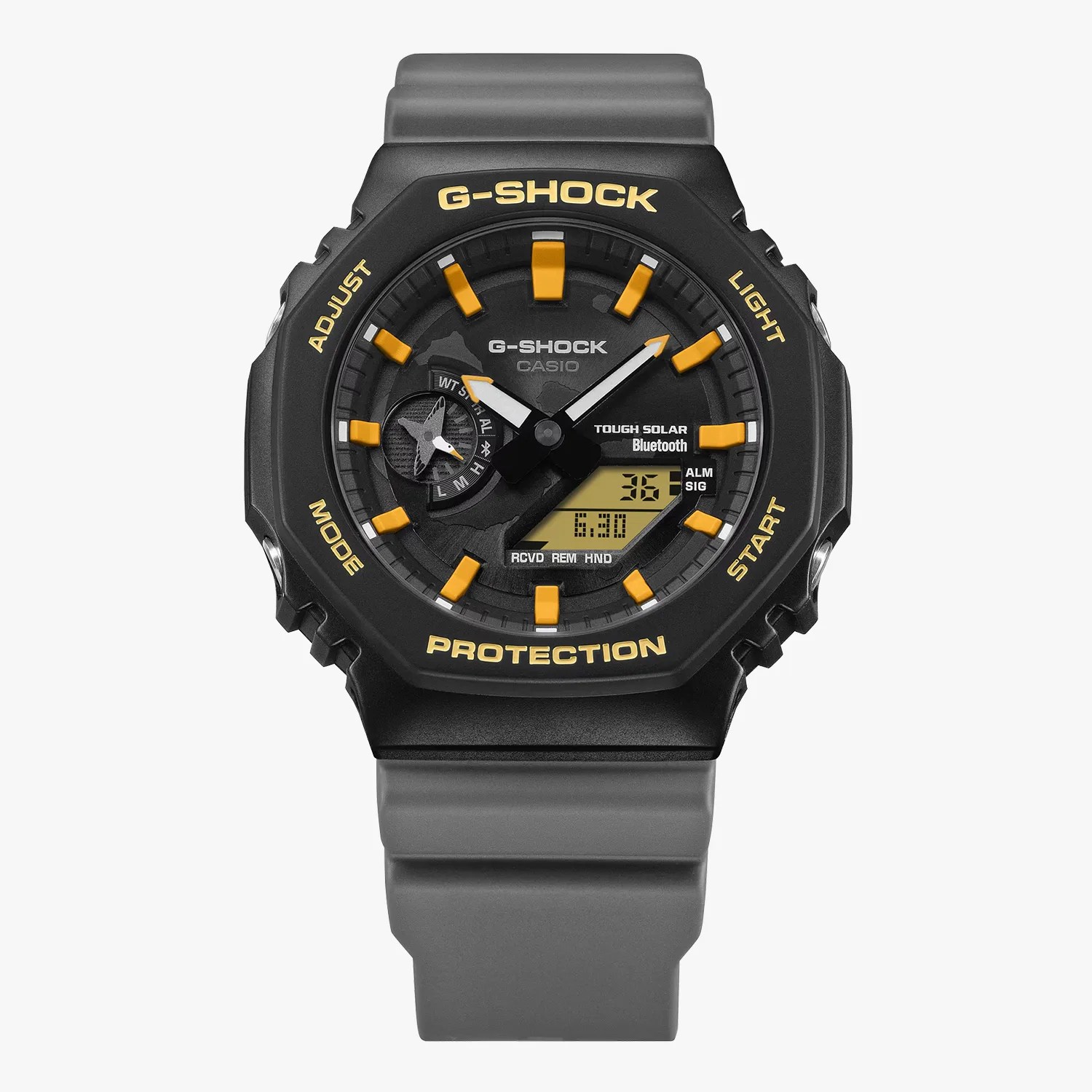 Black and gray Casio G-Shock watch with yellow hour markers and digital display on a gray strap.