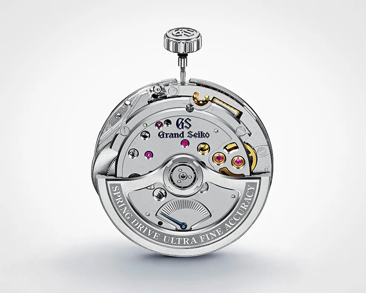 Grand Seiko watch movement with visible jewels and "Spring Drive Ultra Fine Accuracy" engraving.