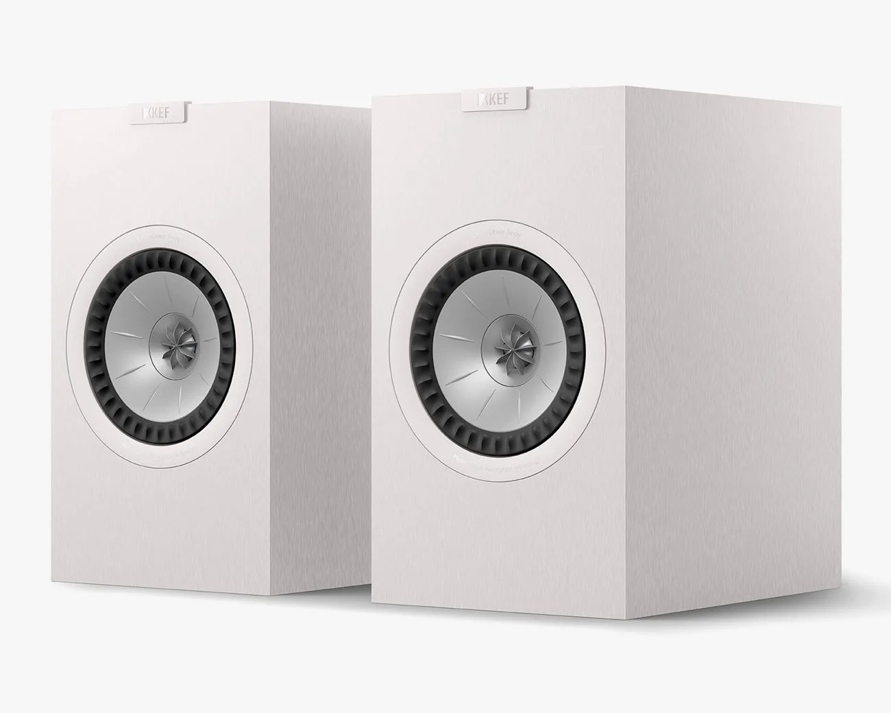 Pair of white rectangular KEF speakers with circular silver and black drivers on the front.