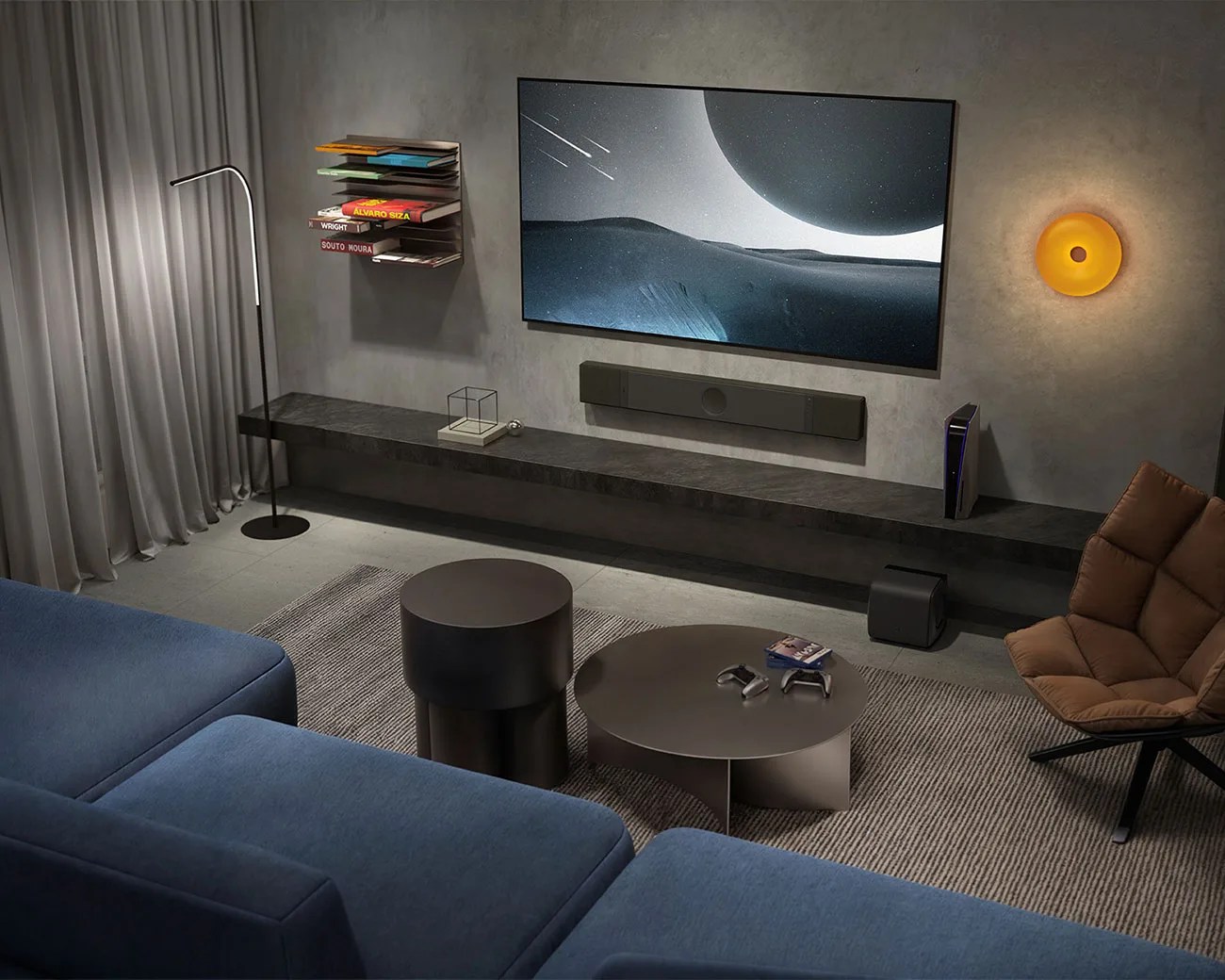 Modern living room with a wall-mounted flat-screen TV, black soundbar, blue sectional sofa, brown cushioned chair, and round black coffee tables on a gray rug.