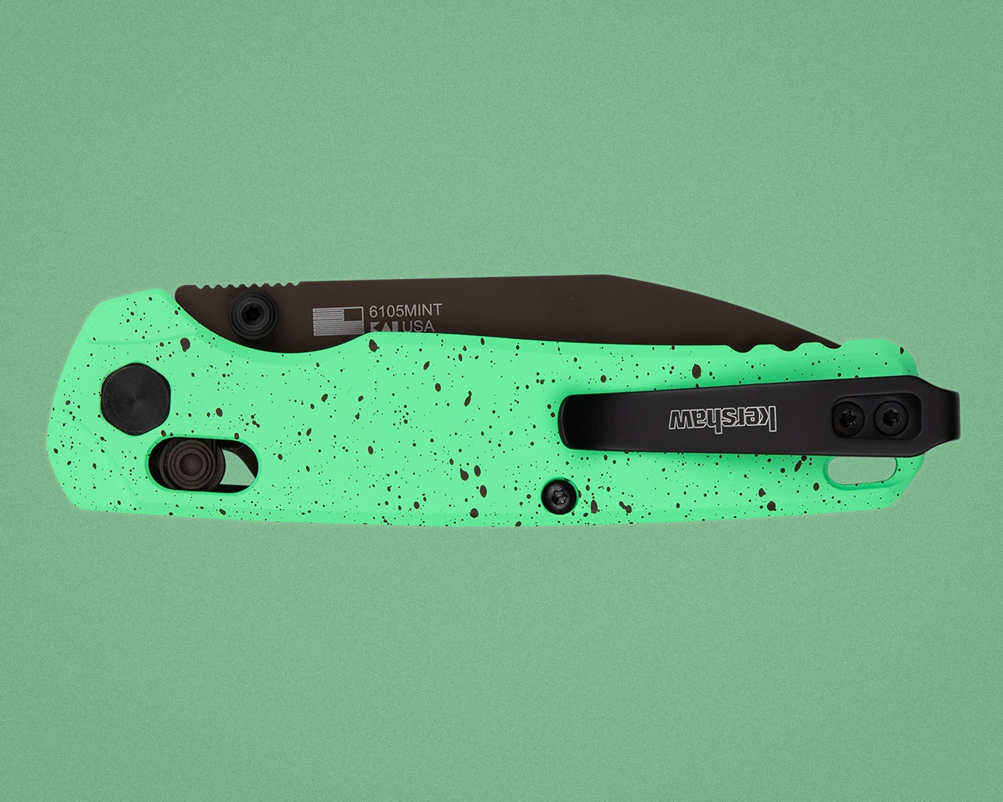 Closed mint green folding knife with black speckles and a black clip labeled "Kershaw" on a green background.