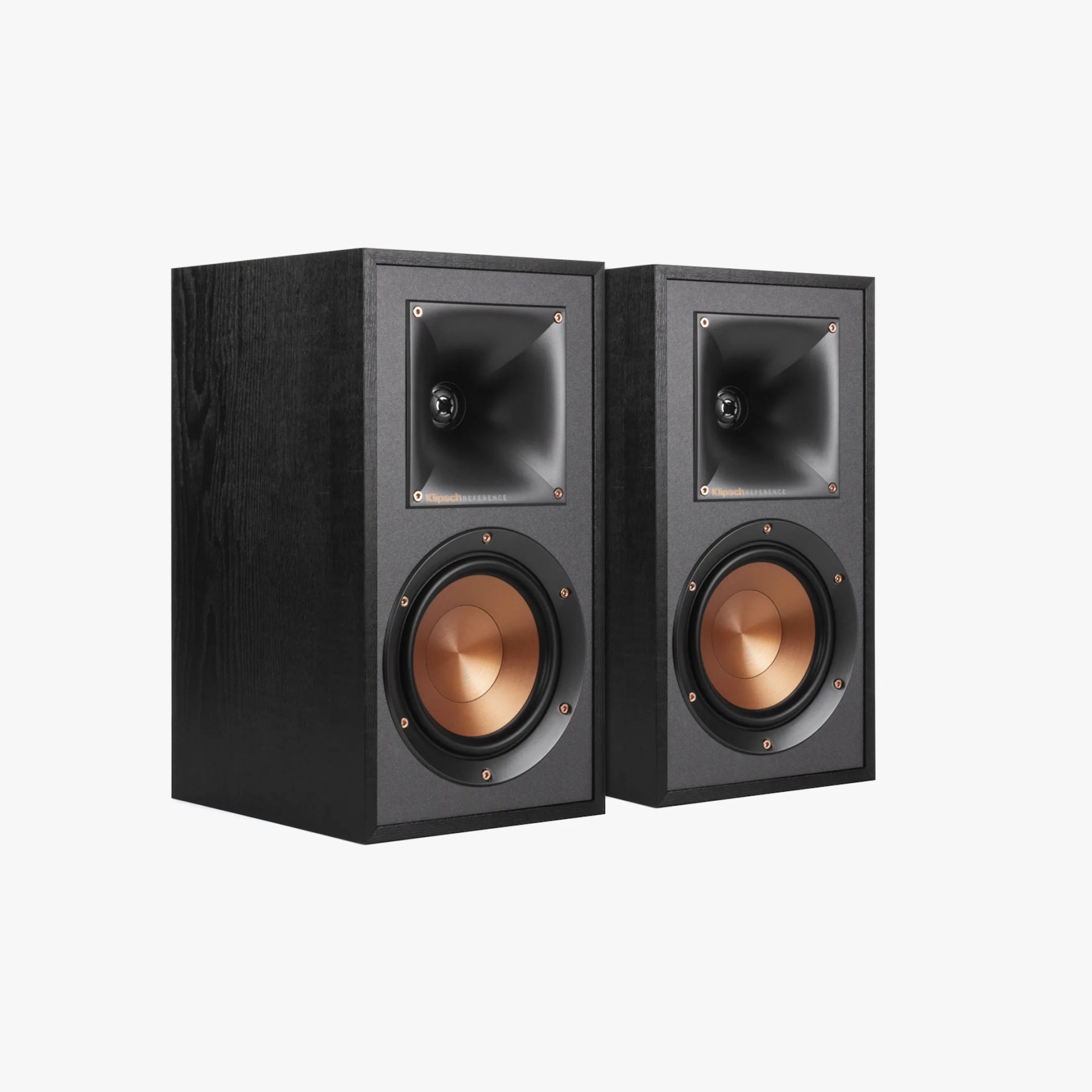 Pair of black rectangular Klipsch Reference bookshelf speakers with copper-colored woofers.