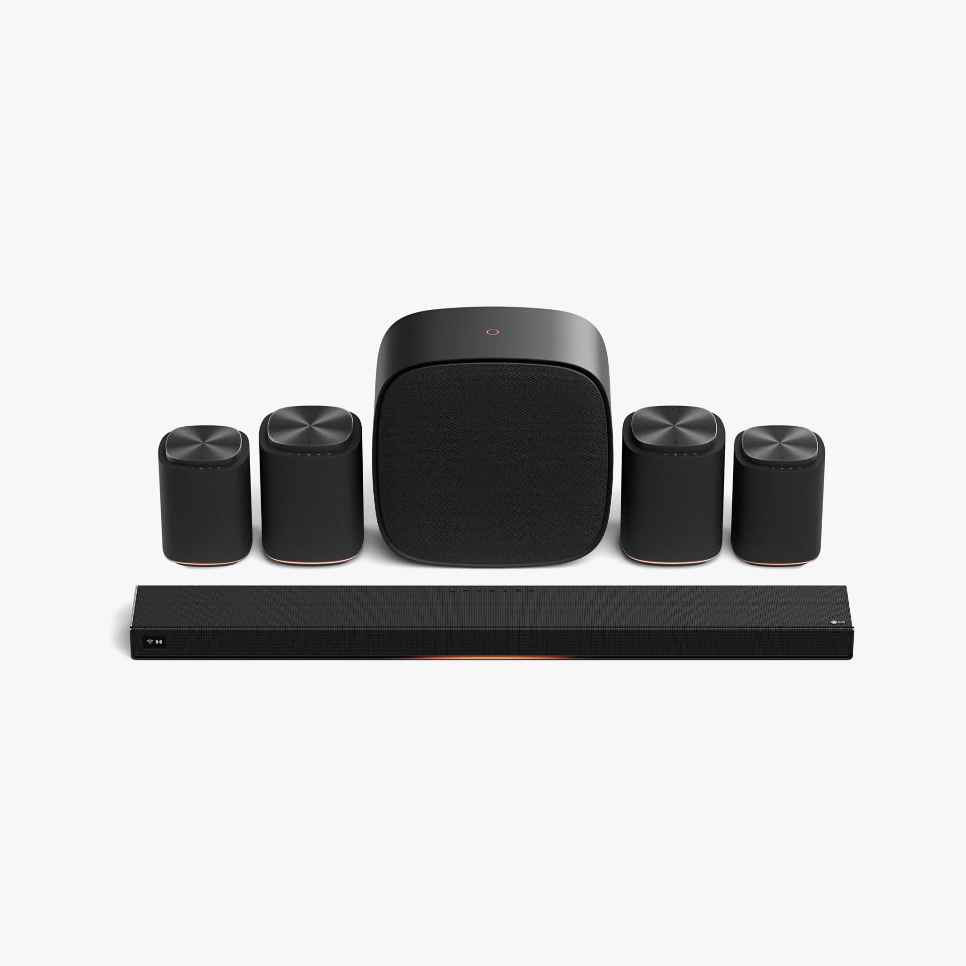 Black LG soundbar system with five satellite speakers and a subwoofer on a white background.