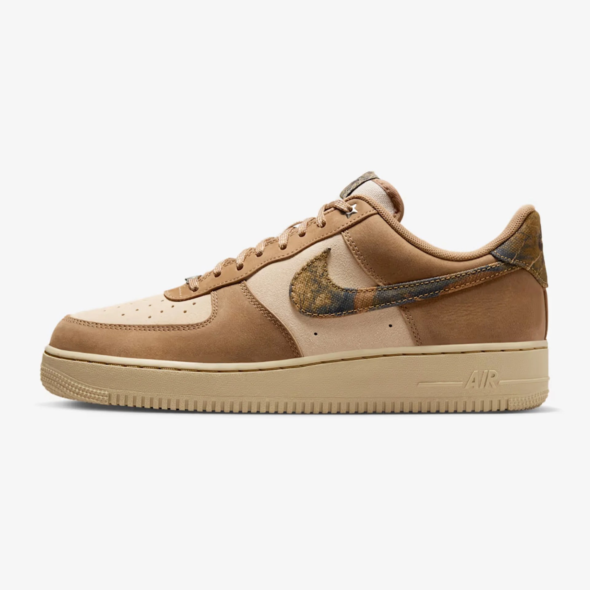 Low-top Nike Air Force 1 sneaker in beige and tan with a textured, multicolor swoosh and matching heel tab.