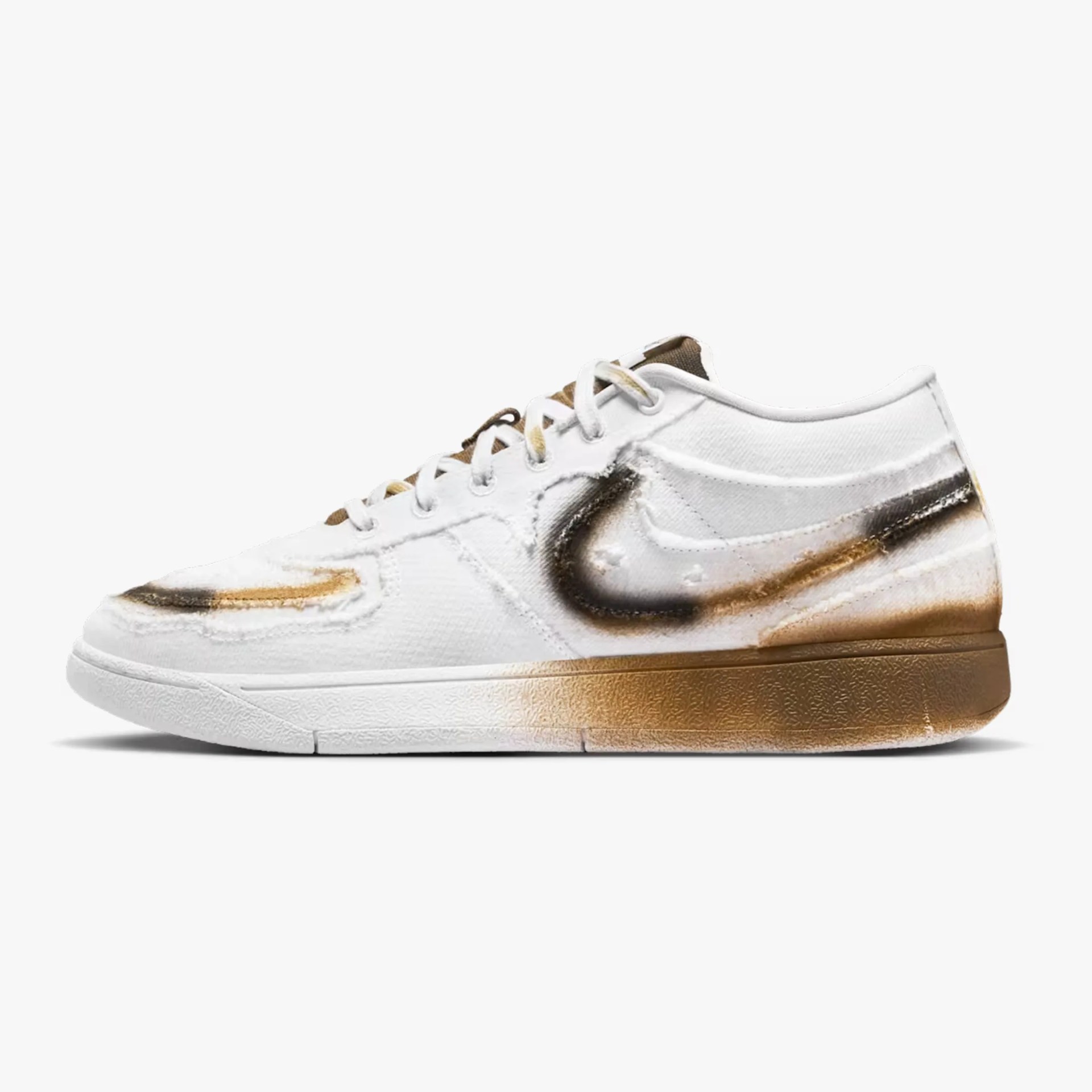 White low-top sneaker with brown and black gradient paint effects on the sole and sides.